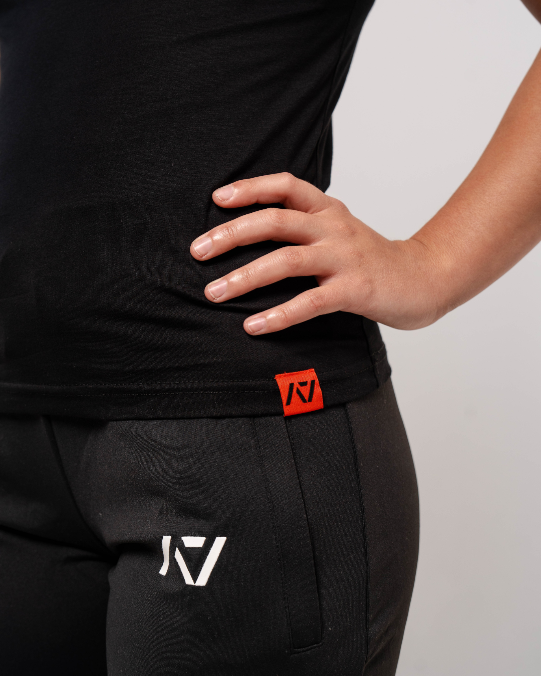 Demand Greatness True-Fit Women's Meet Shirt - Red Dawn