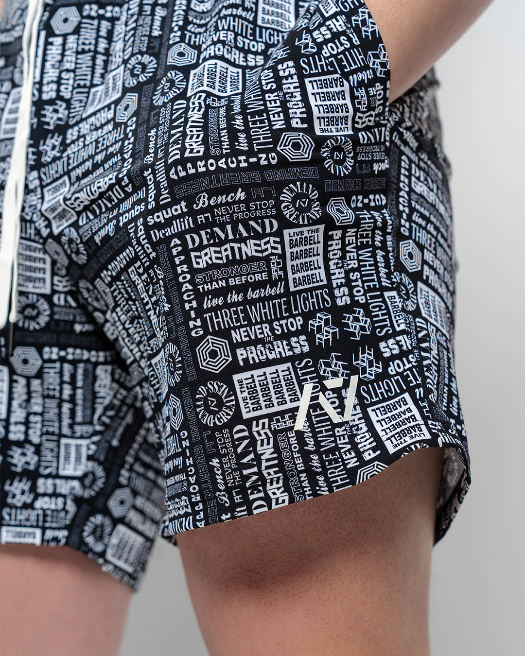 Matte silicone A7 logos on the Affirmation 360Go Shorts offering a minimalist and durable design.