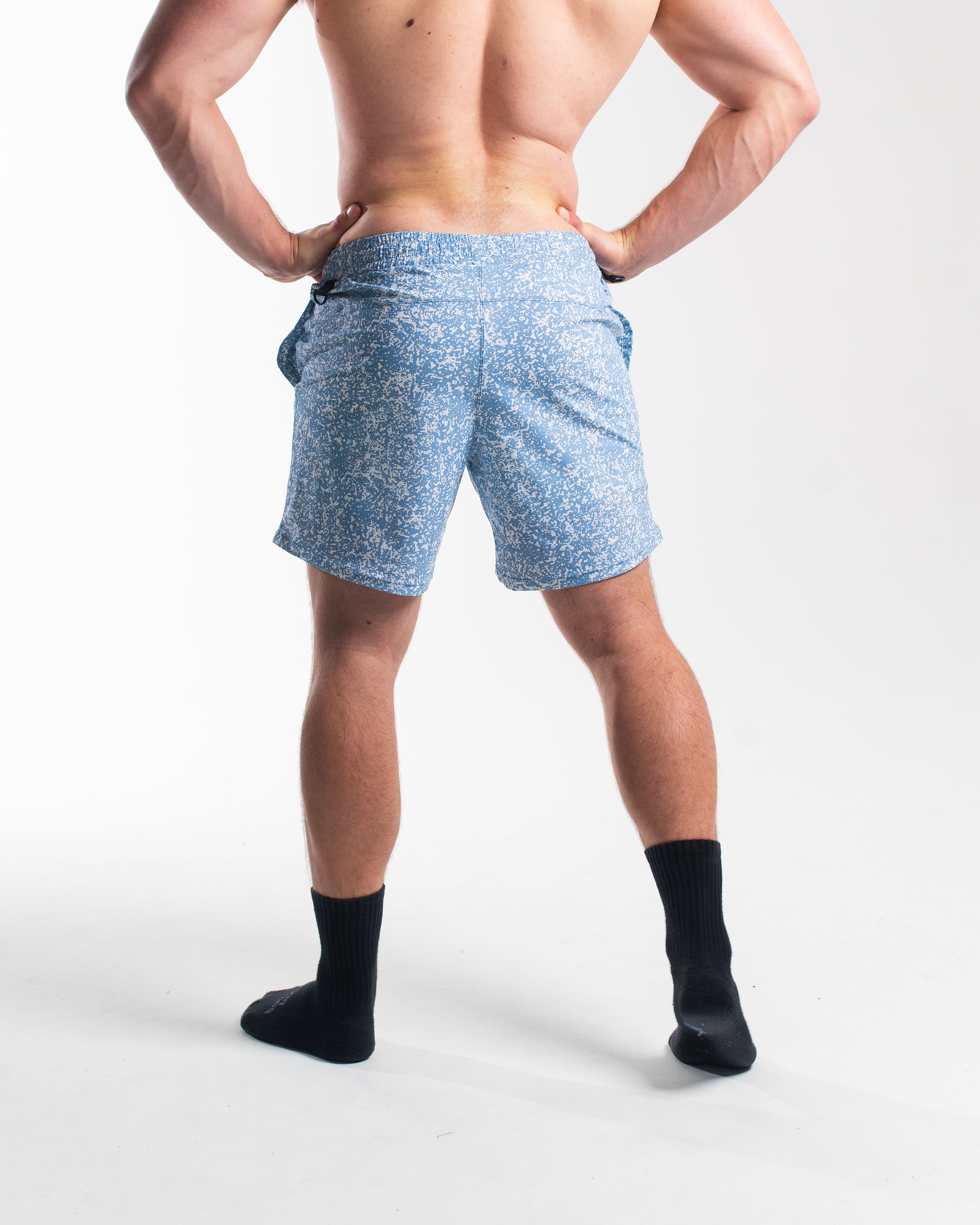 Rear view of 360Go 1Z Shorts in Slate Blue with ripstop loop-through pockets and streamlined silhouette.