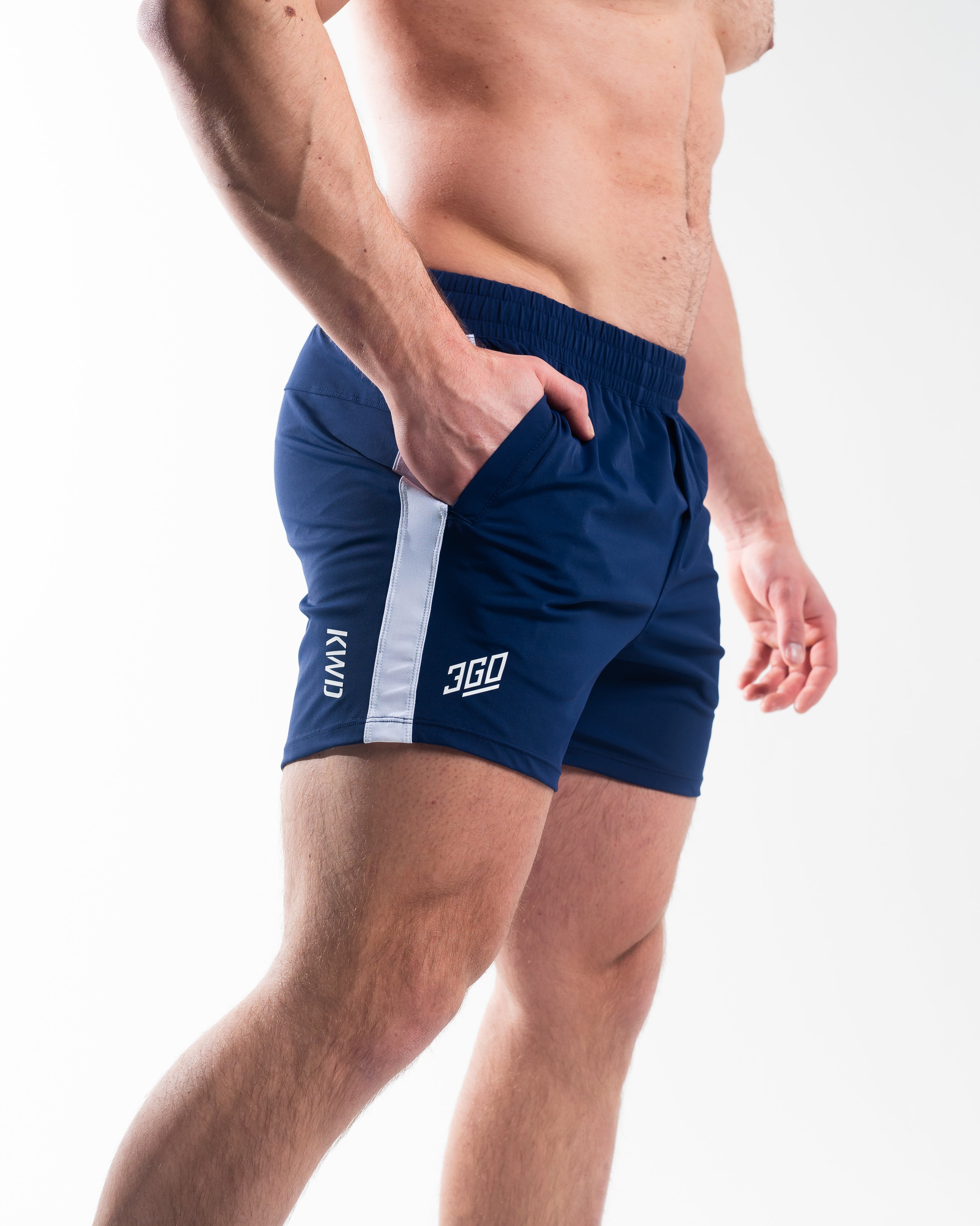 Side profile of Night Light 360Go KWD Shorts showcasing shorter inseam, stretch fit, and high-mobility design.