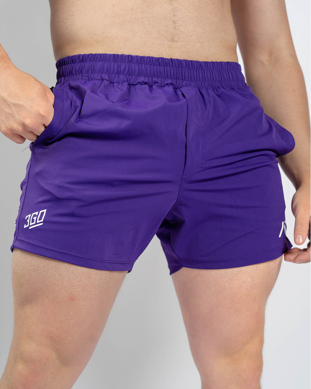Front view of A7 360Go KWD Shorts in Purple featuring athletic fit, wide waistband, and vibrant color.