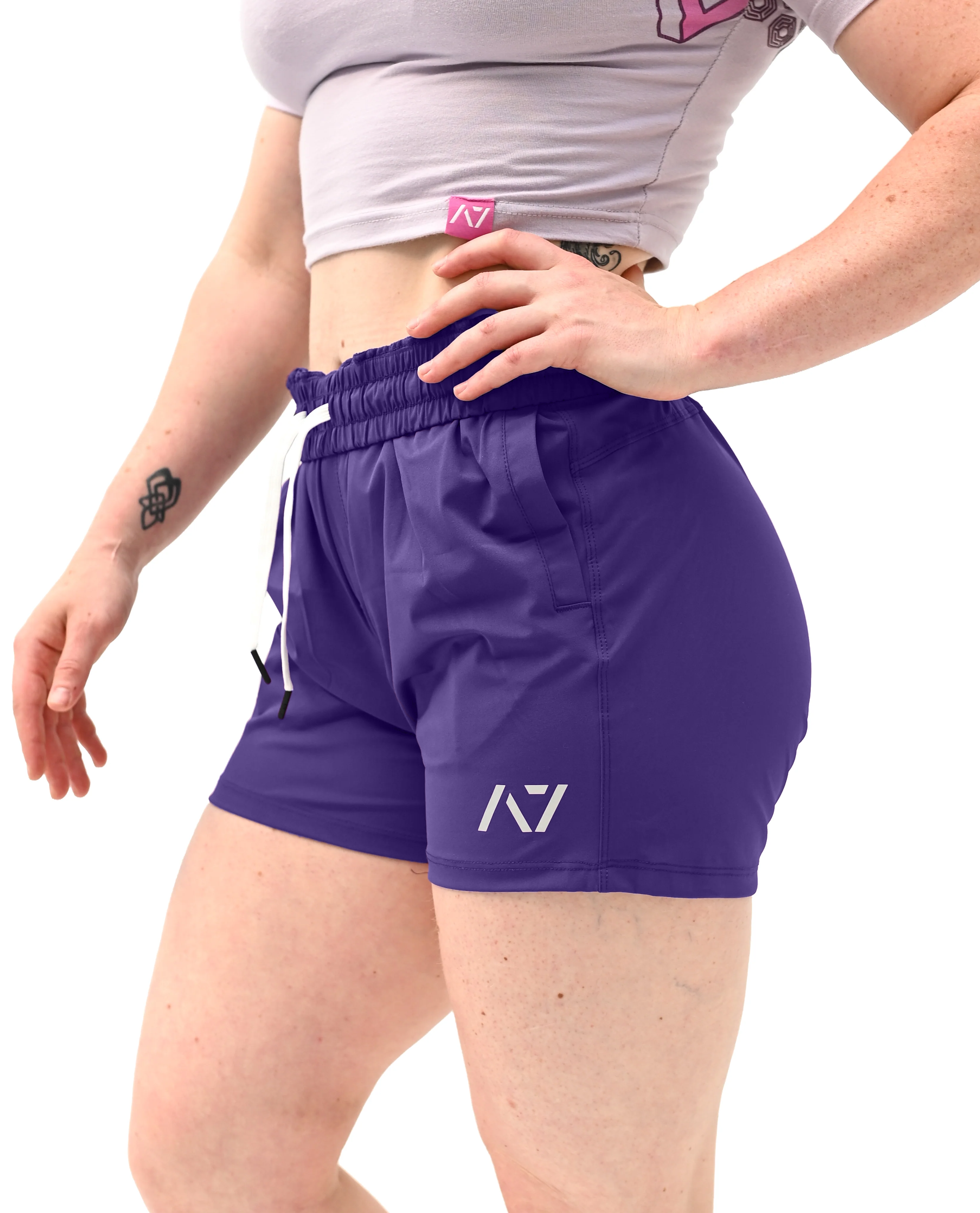 Side profile of Purple 360Go KWD Shorts showcasing short inseam and 360° stretch construction for mobility.