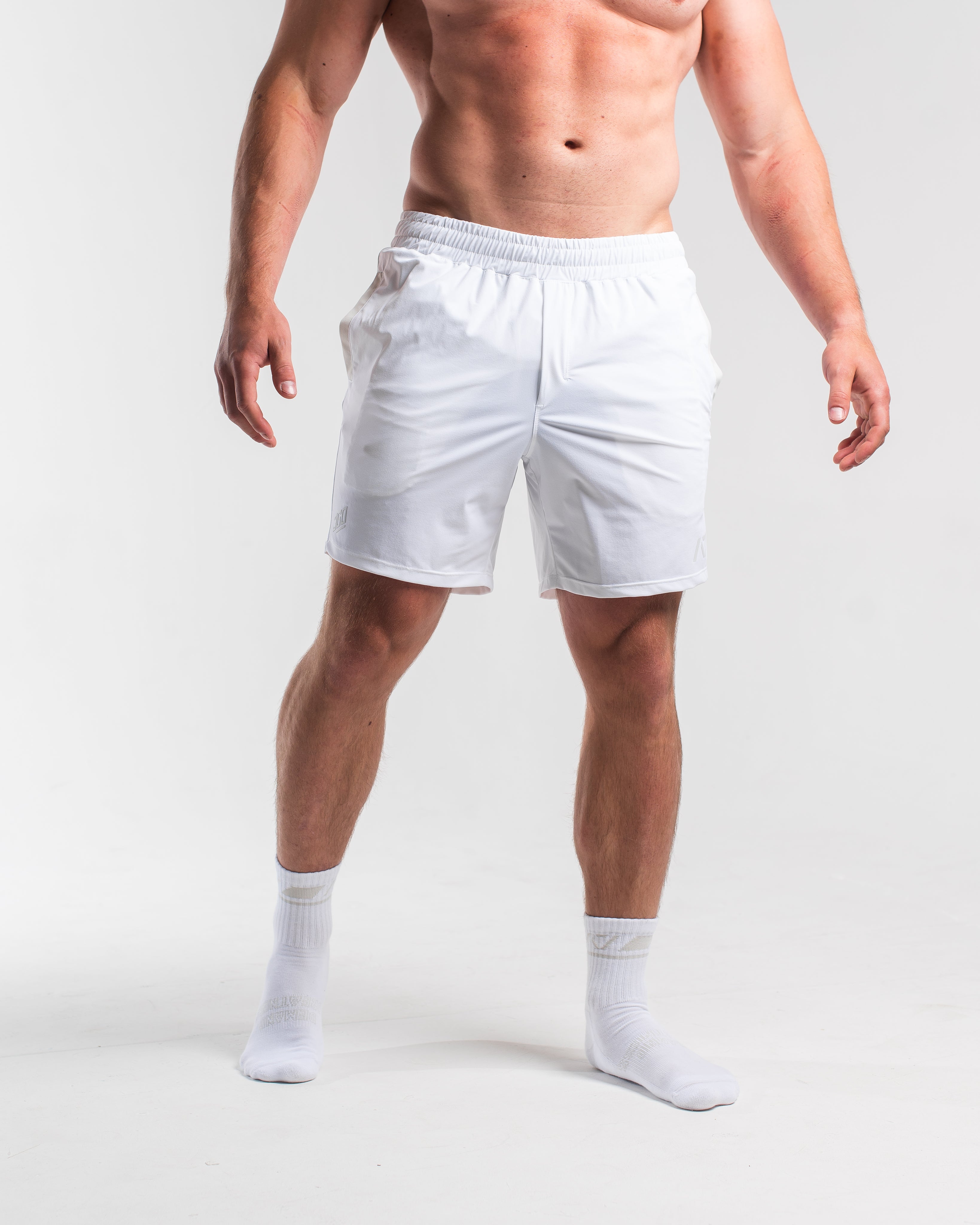 Front view of A7 360Go Shorts in Polar white, Regular inseam, featuring minimalist style and wide waistband.