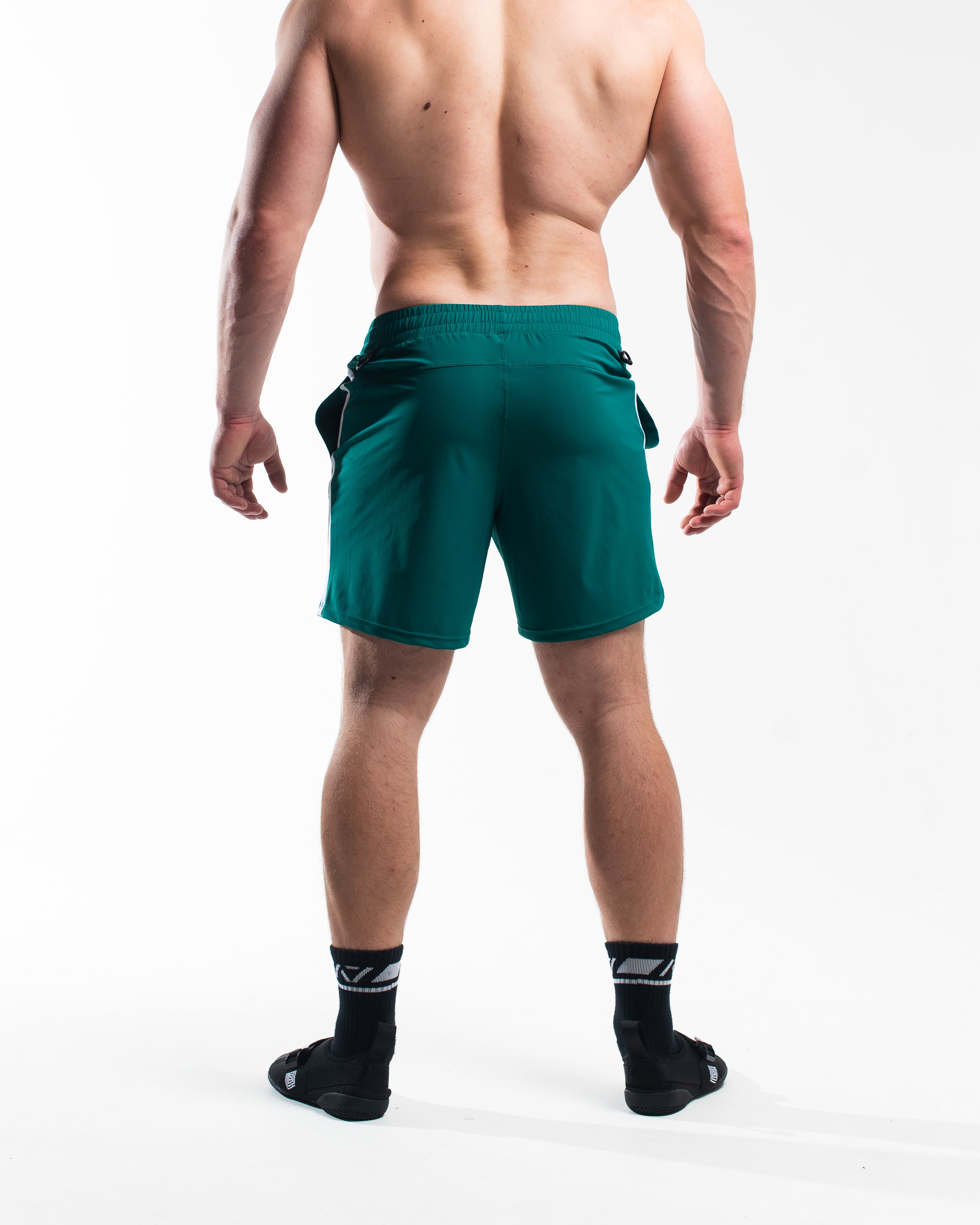Rear view of A7 360Go Shorts in Terragreen with ripstop loop-through pockets and athletic performance fit.