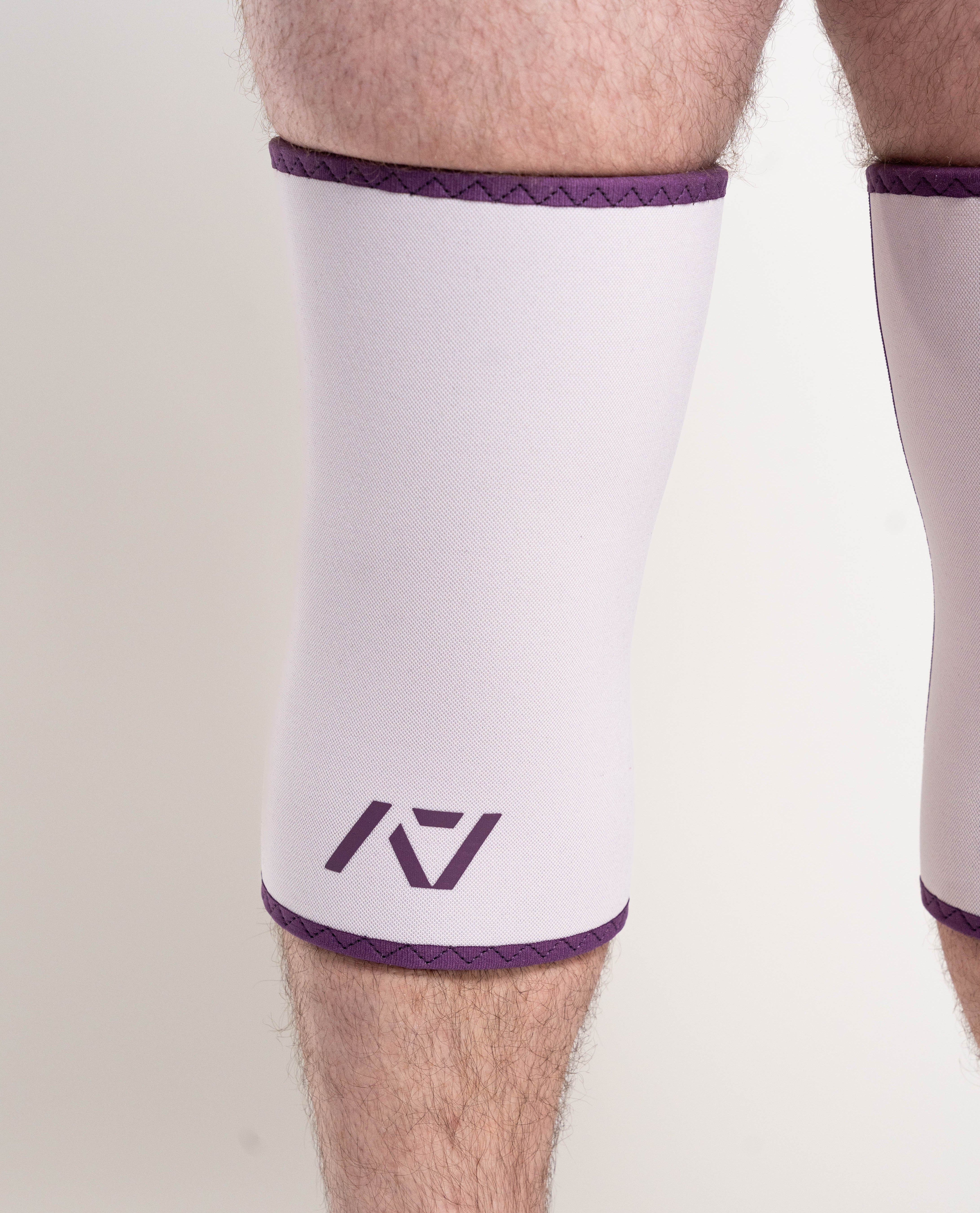 Close up of A7 Logo and colours on Hourglass Knee Sleeves in Lavender