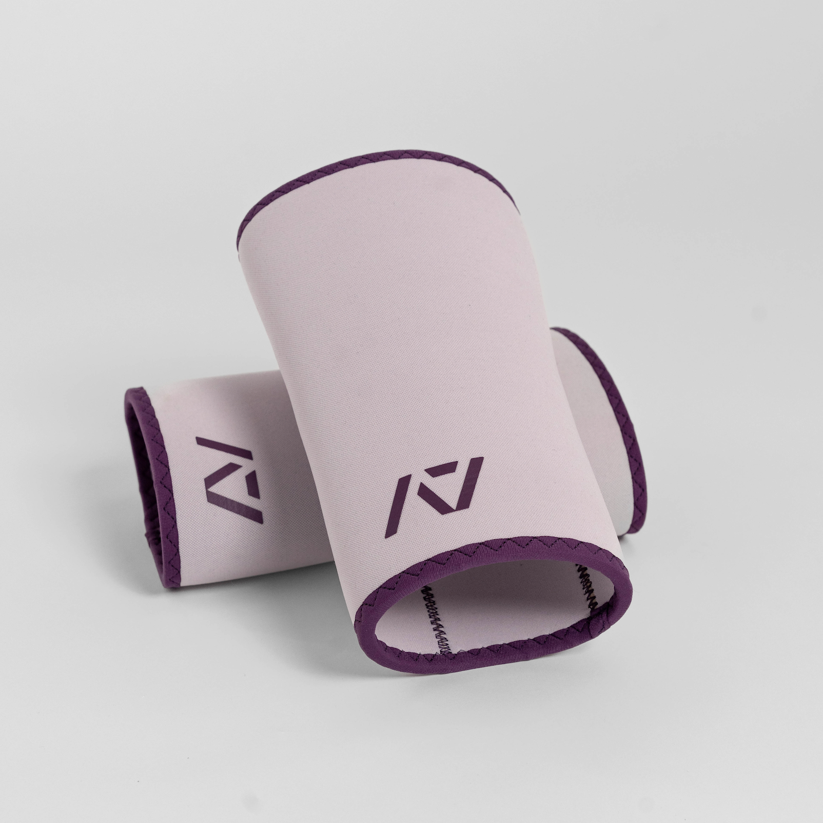 Flat lay of Hourglass Knee Sleeves in Lavender