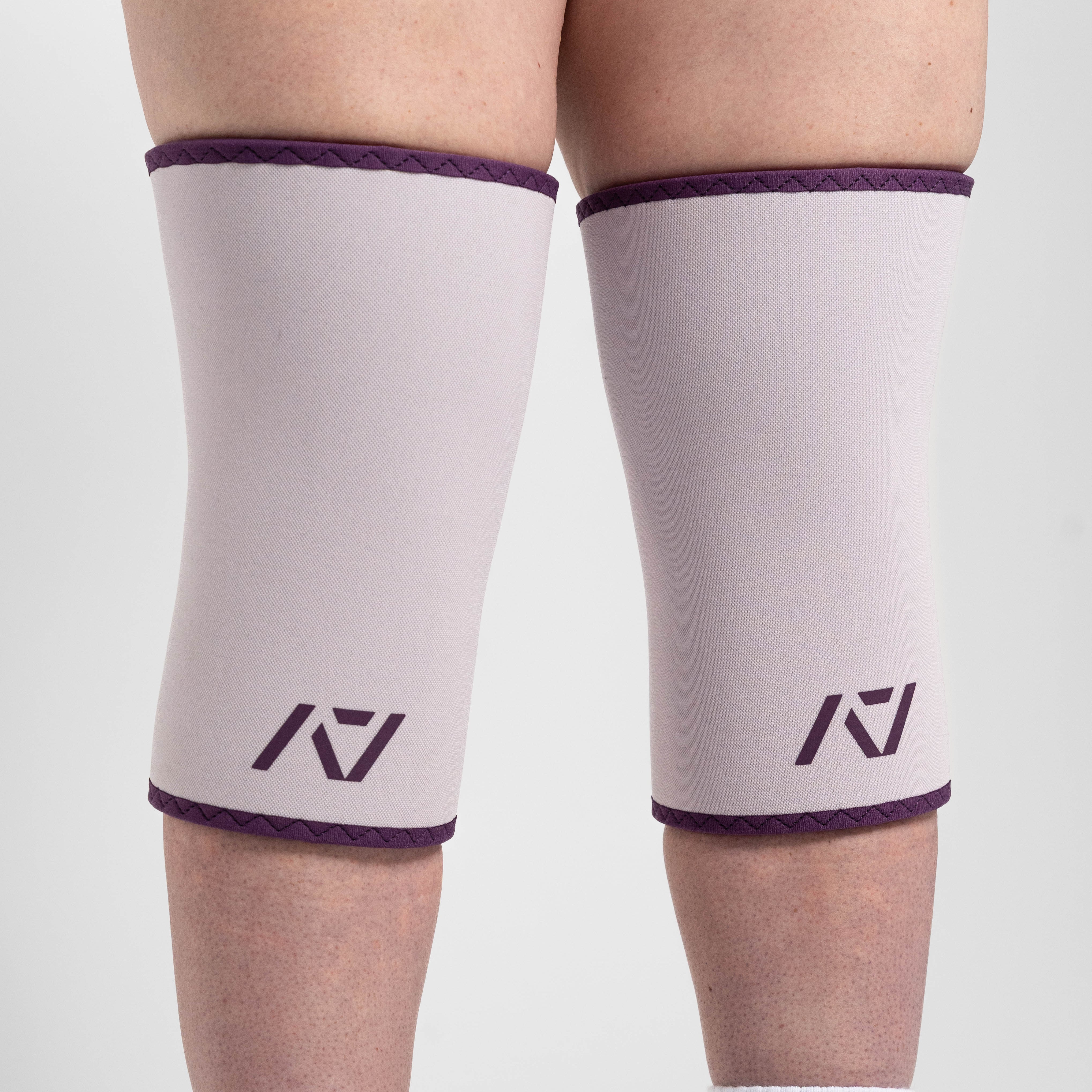Close up of hourglass knee sleeves in Lavender on female
