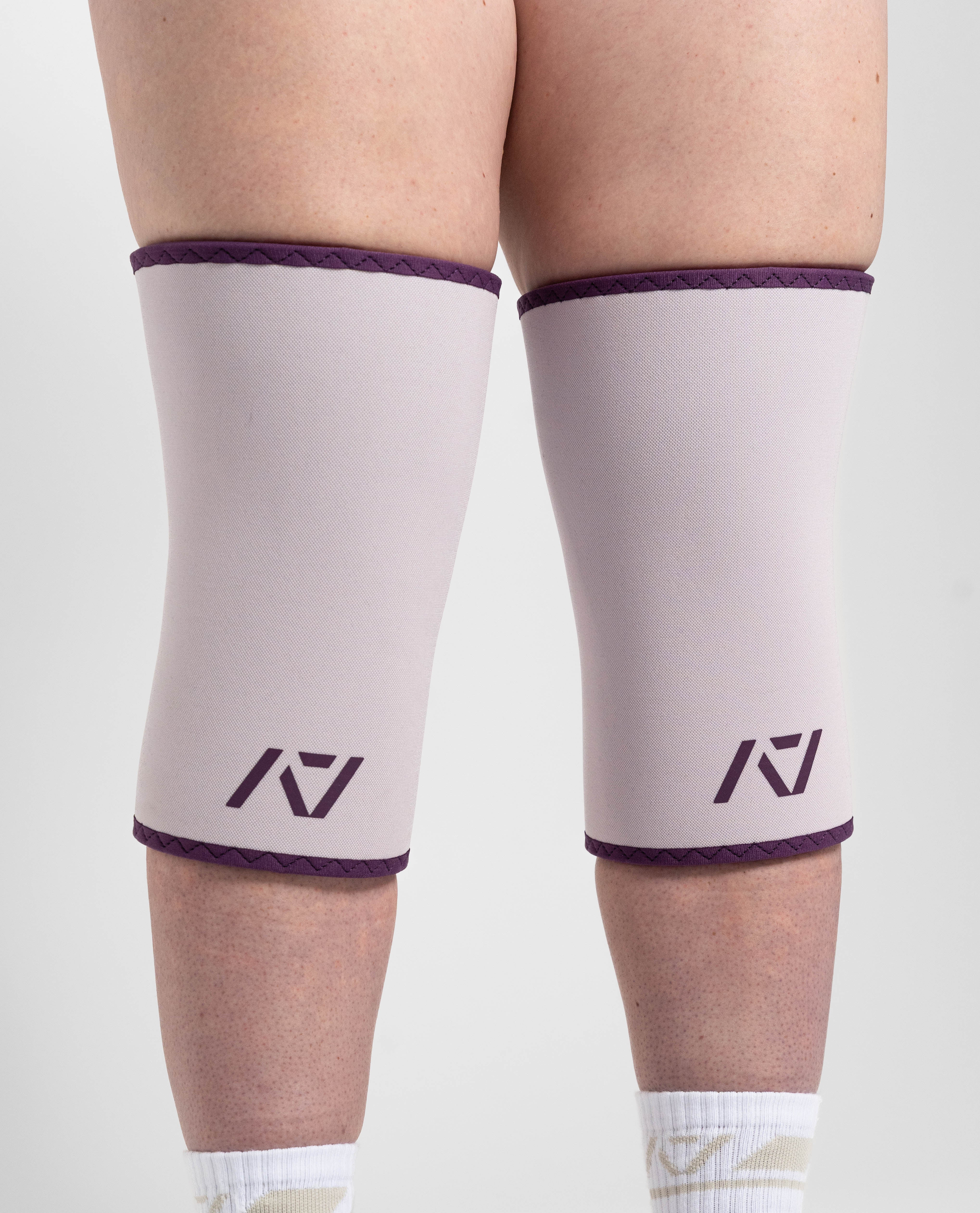 Close up of hourglass knee sleeves in Lavender on female