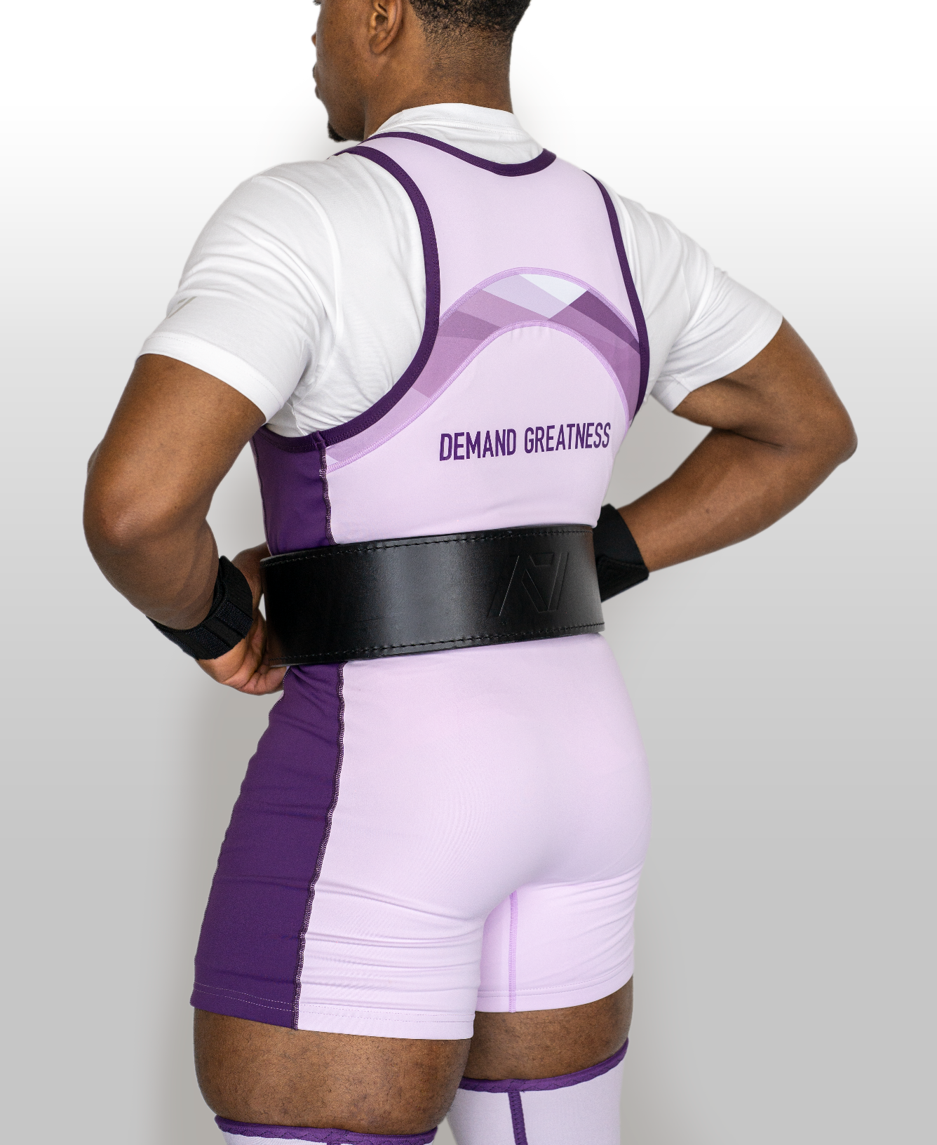 Back shot of Lavender Rausch Singlet on male model, showcasing cut and compression fit