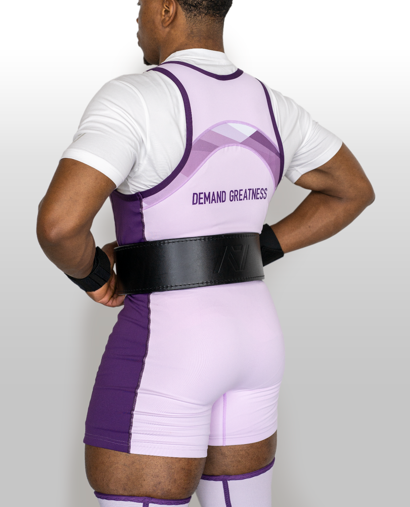 Back shot of Lavender Rausch Singlet on male model, showcasing cut and compression fit