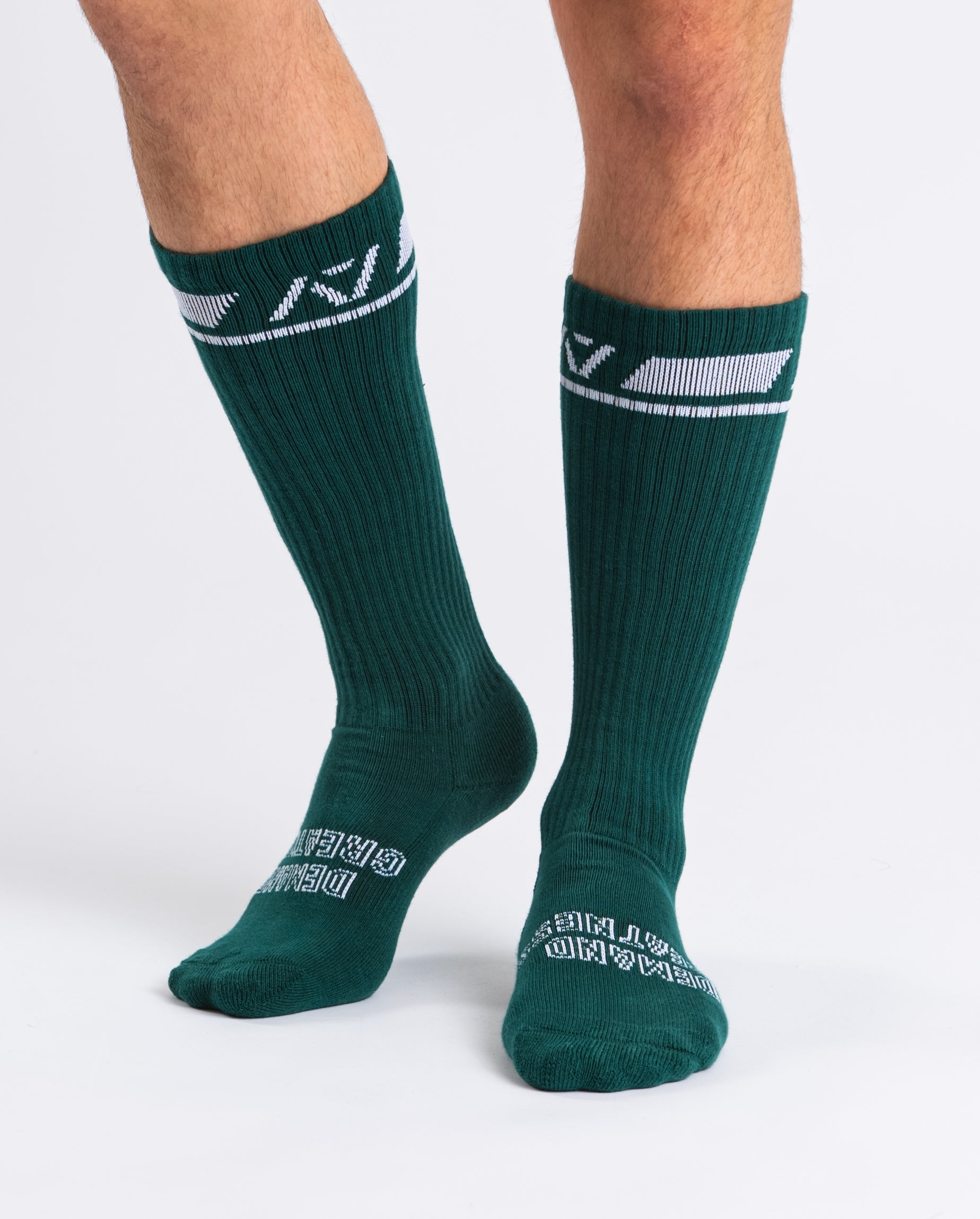 Side profile of A7 Deadlift Socks in Emerald Forás, highlighting the A7 logo on the ankle and compression-style top.