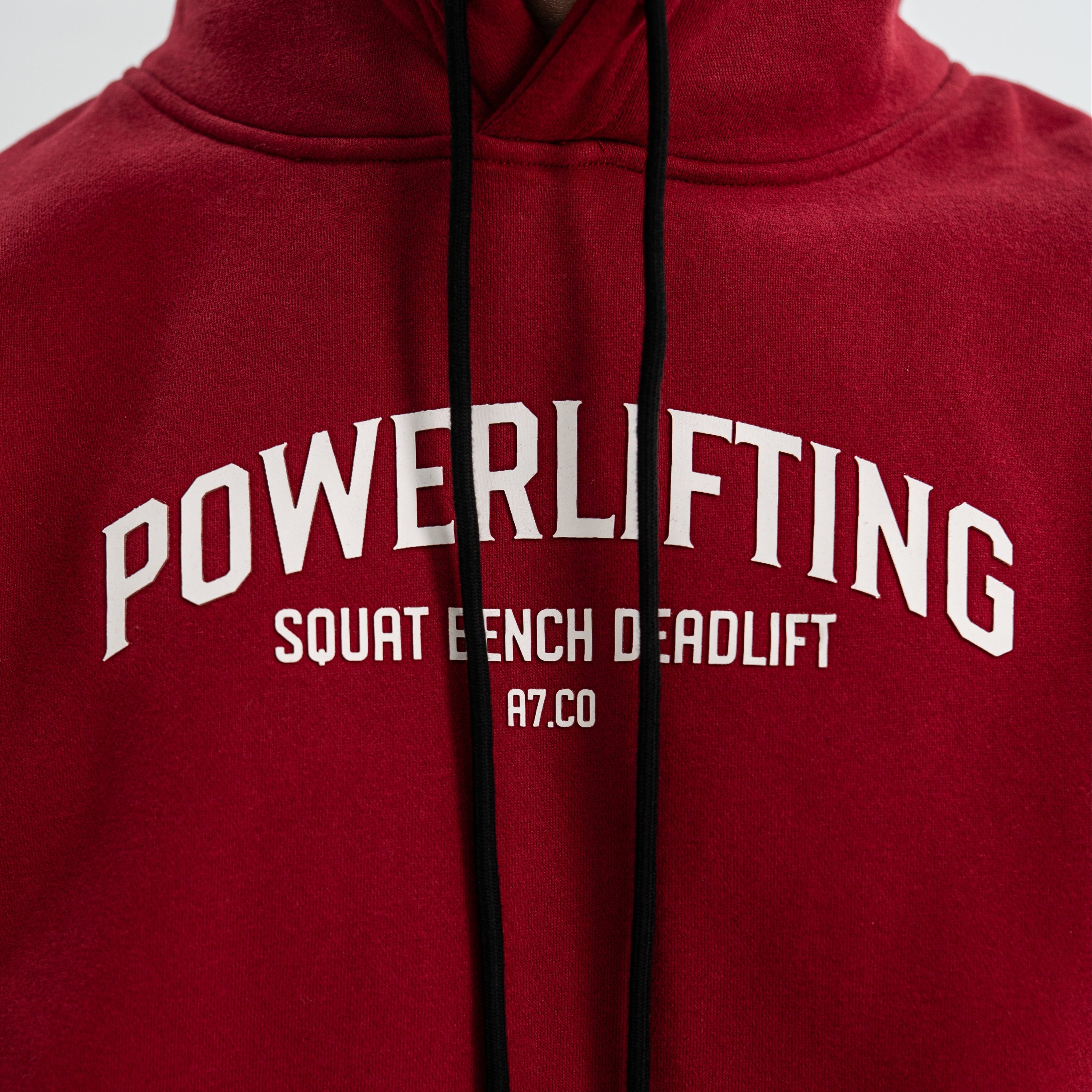 Red Bar Grip hoodie with 'POWERLIFTING' text on a plain background