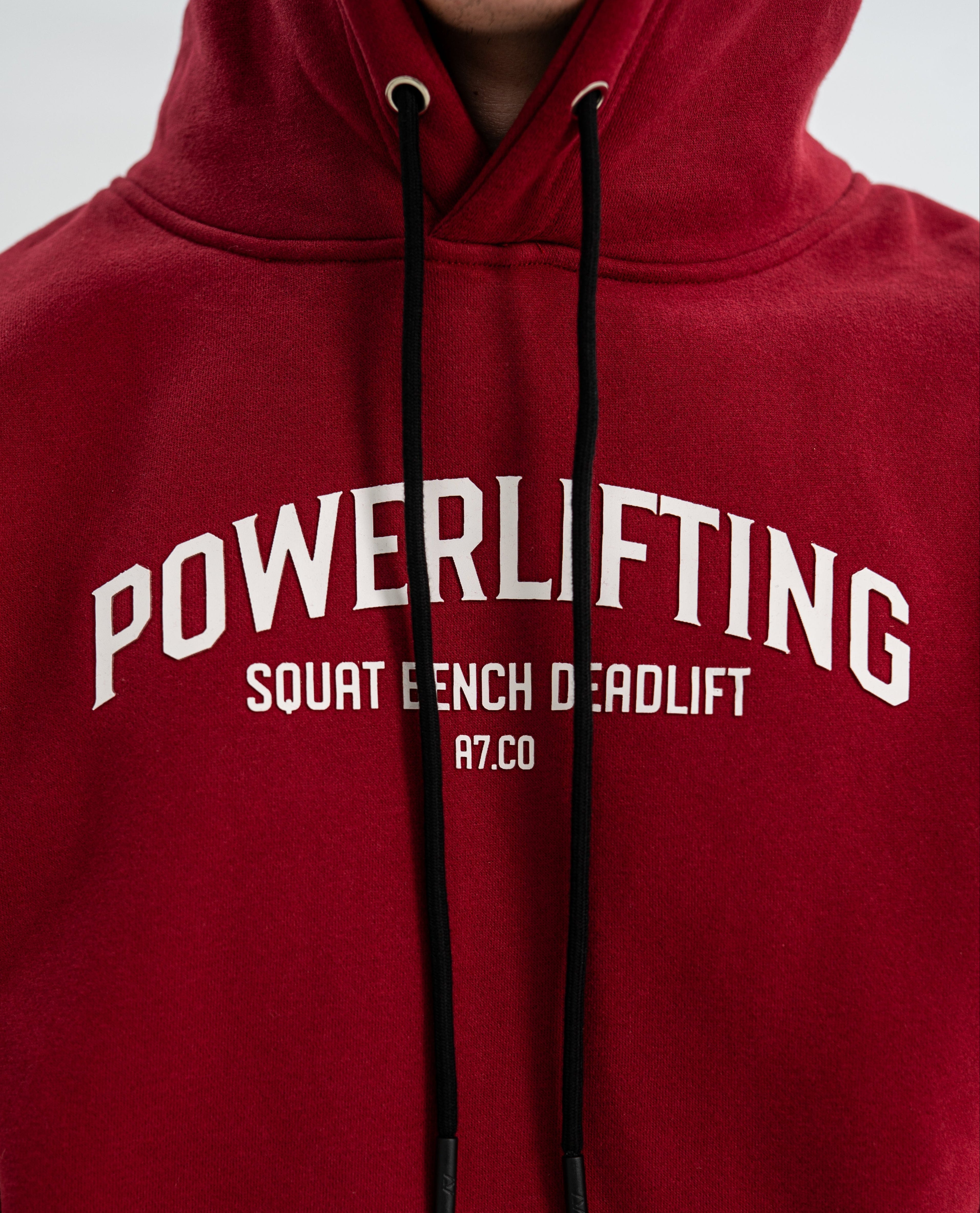 Red Bar Grip hoodie with 'POWERLIFTING' text on a plain background