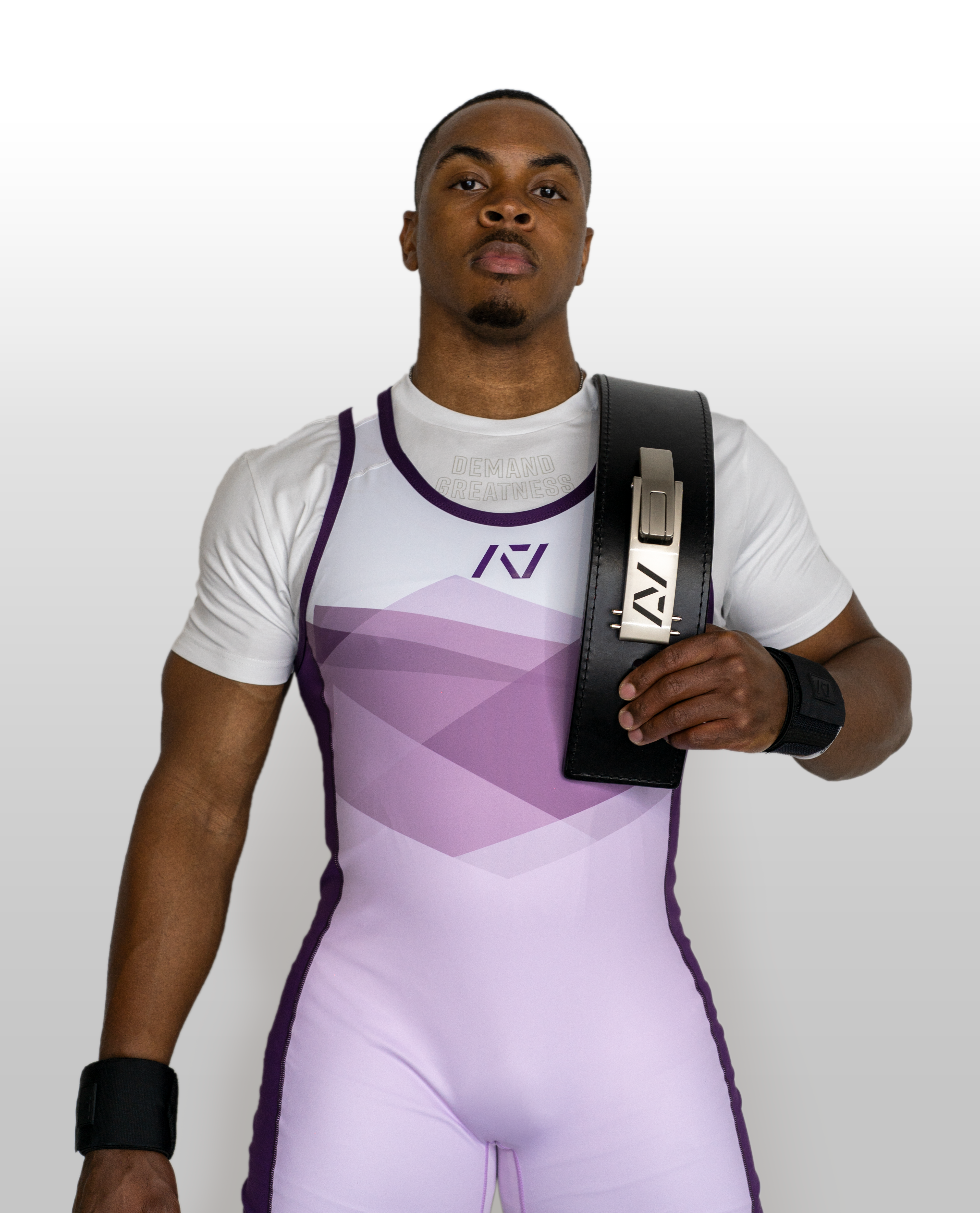 Front shot of male model wearing rausch men's singlet in lavender showcasing shit and compression