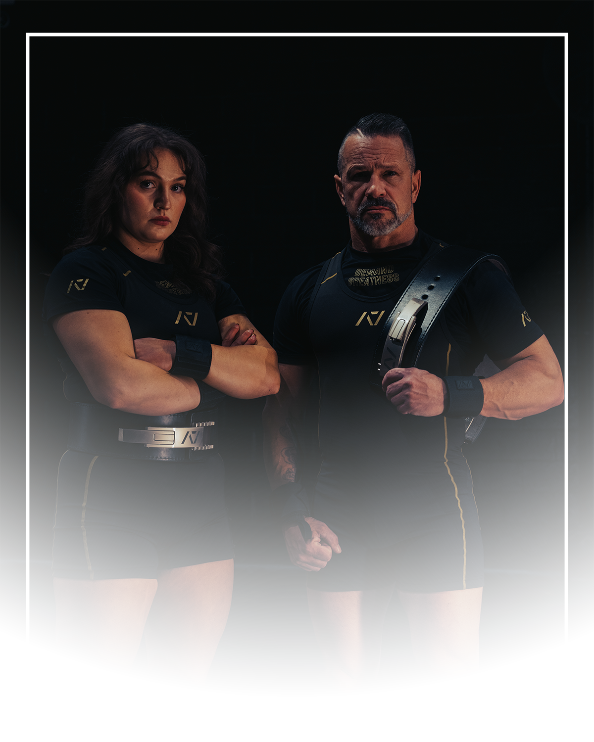 Two lifters wearing Rausch Gold Standard Singlets