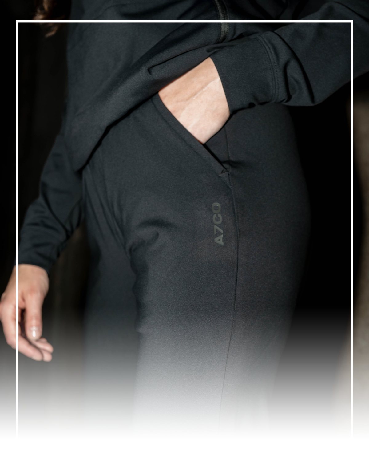 Female wearing cobra 1z joggers with hand in pocket