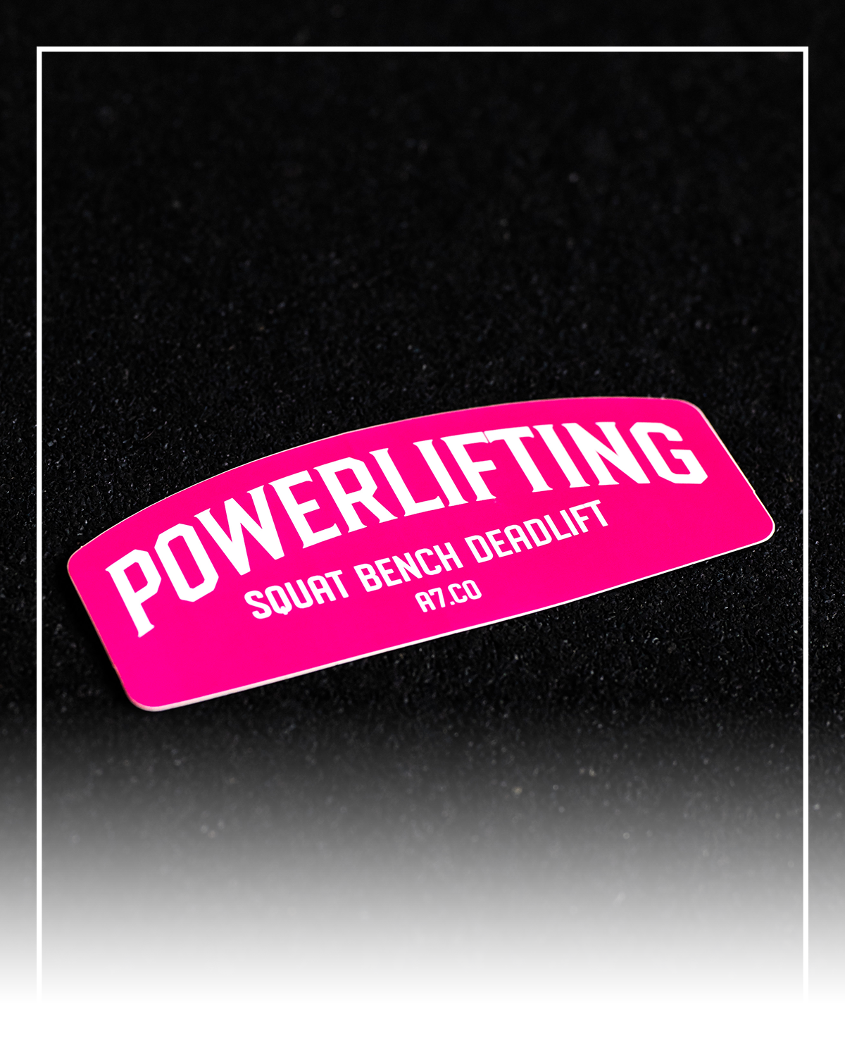 Pink 'Powerlifting' sticker on a black background