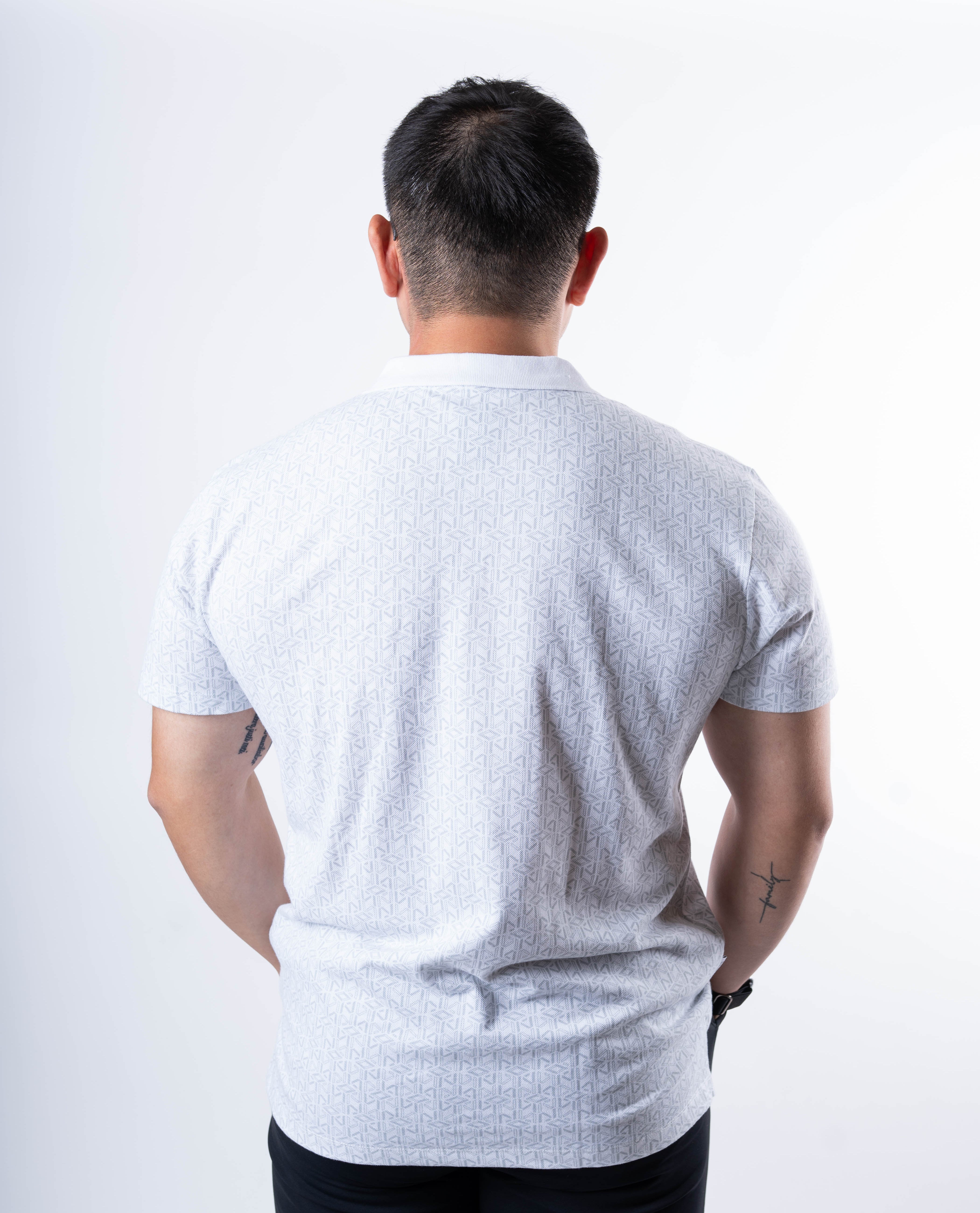 Back view of A7 Cotton Polo in Stelacrosha Gray, highlighting the tennis tail design.