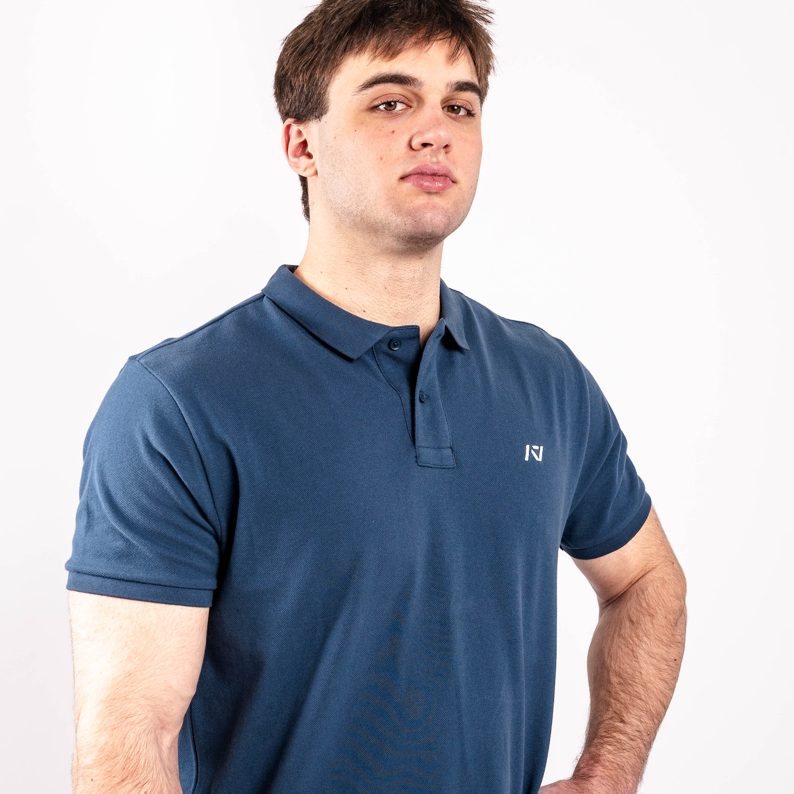 Model wearing the A7 Cotton Polo in Tides Blue, demonstrating fit and style.