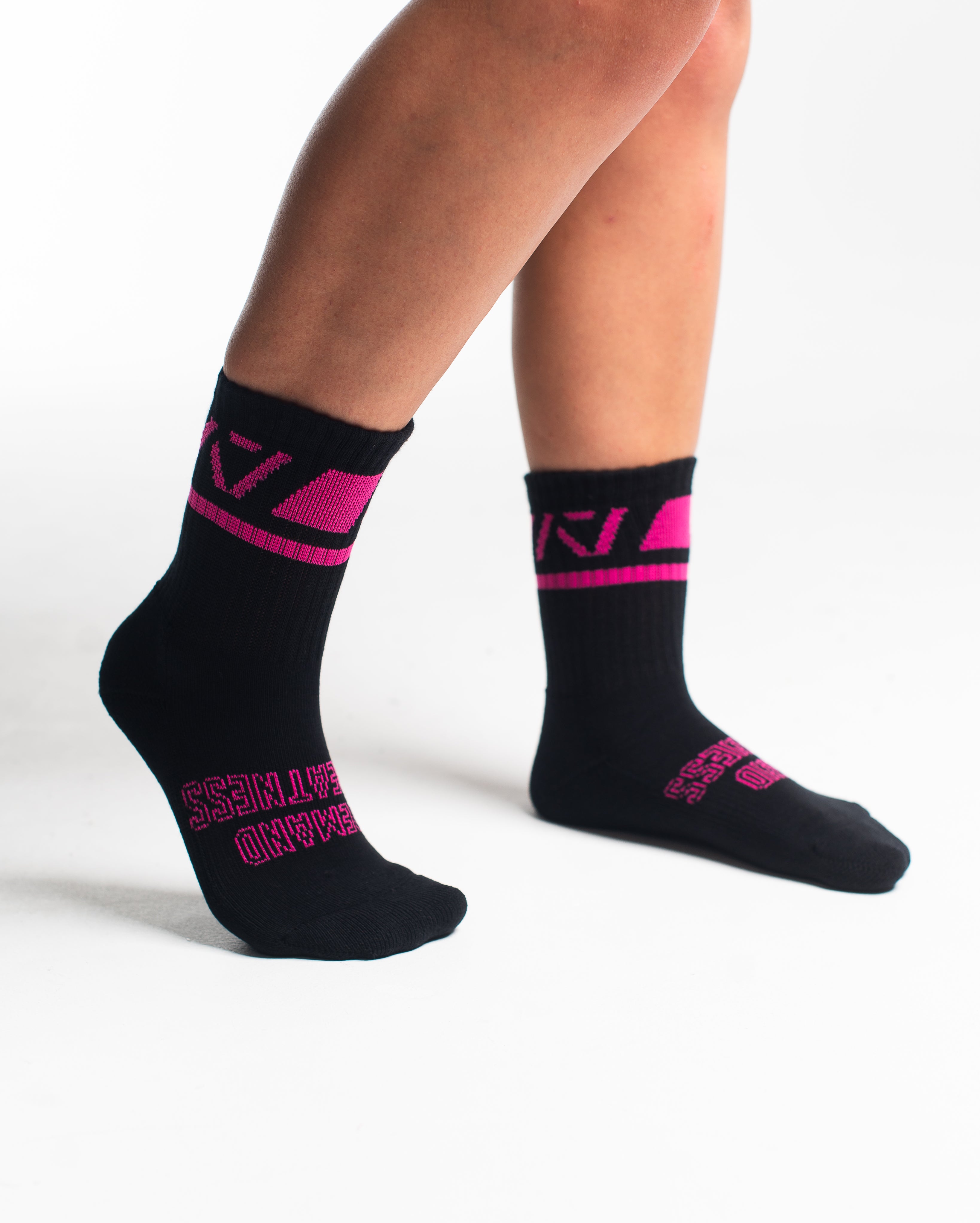 Side profile of A7 Crew Socks in Flamingo, highlighting the A7 logo on the ankle and compression-style top.