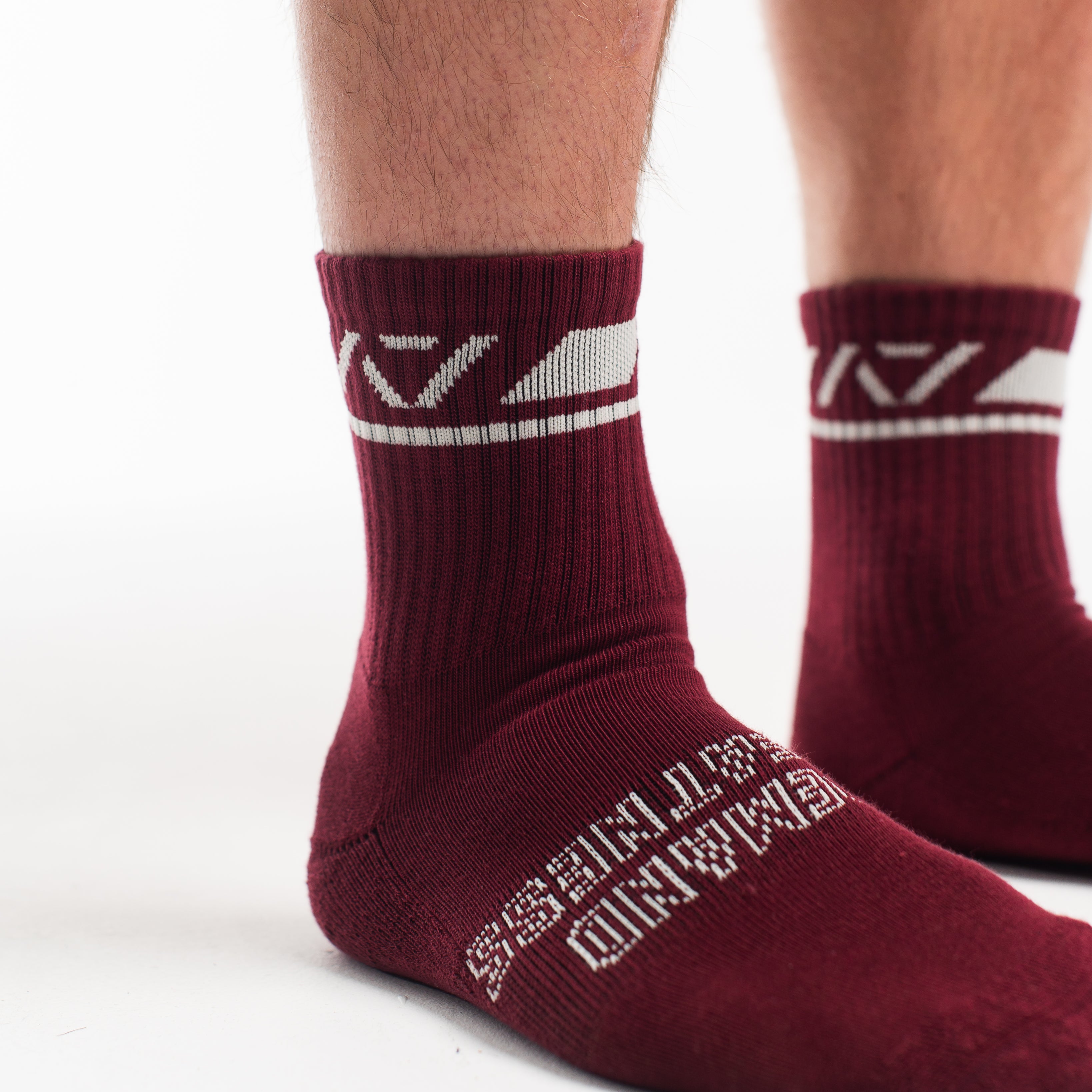 Close-up of the knit fabric on A7 Crew Socks in Ivory Rose, showing texture and stitching details.