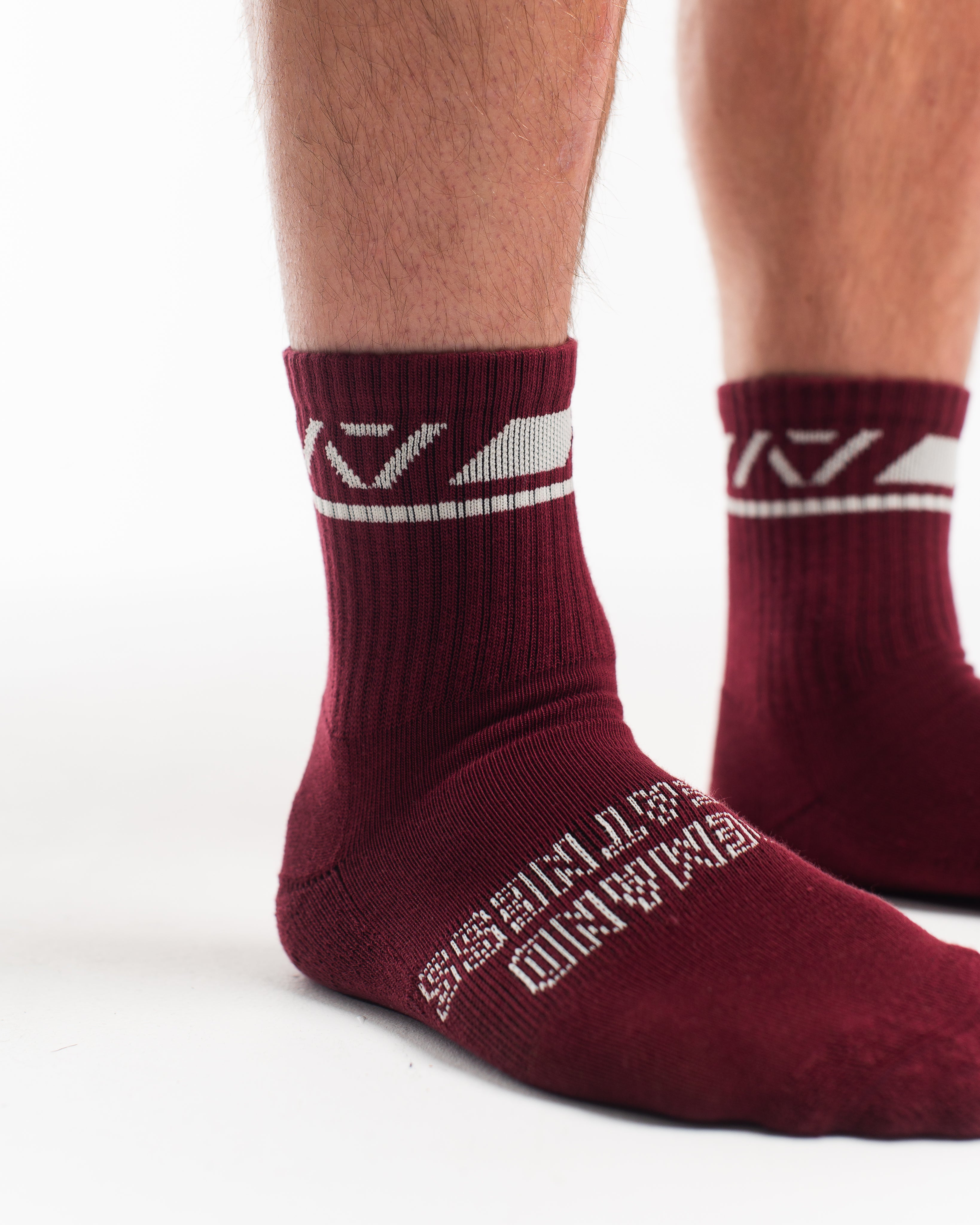 Close-up of the knit fabric on A7 Crew Socks in Ivory Rose, showing texture and stitching details.