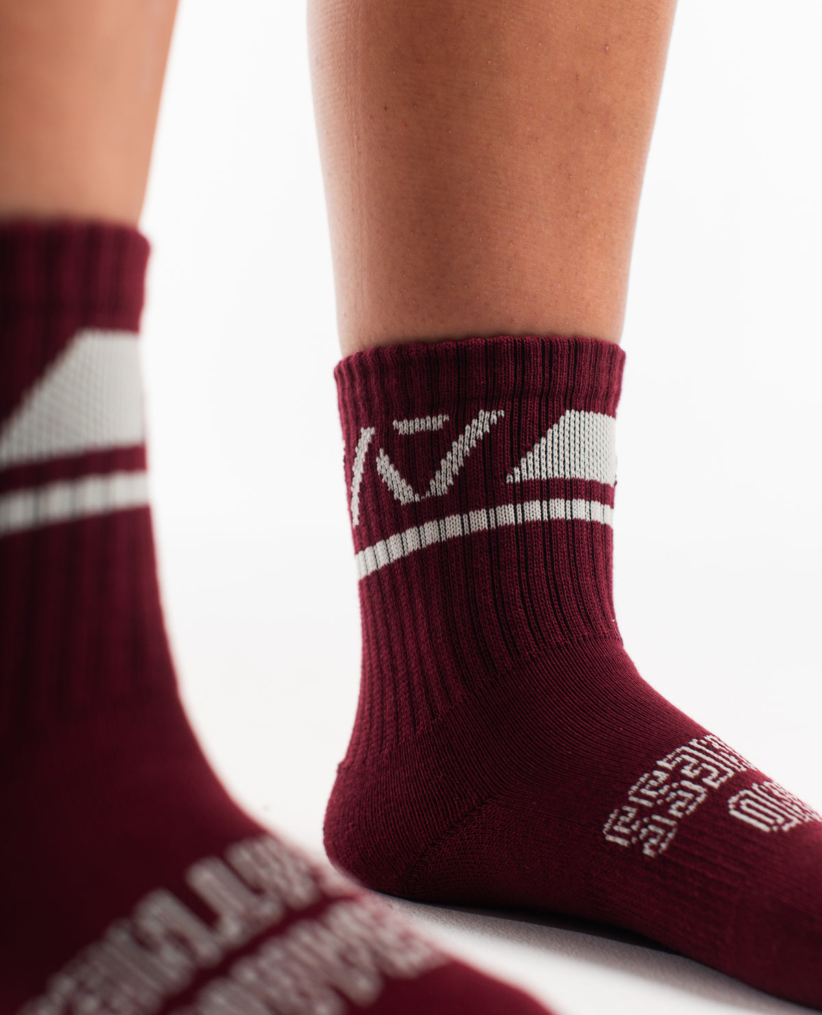 Close-up of the knit fabric on A7 Crew Socks in Ivory Rose, showing texture and stitching details.