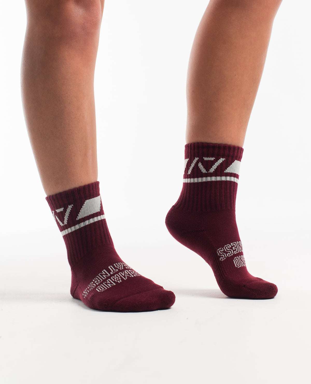 Side profile of A7 Crew Socks in Ivory Rose, highlighting the A7 logo on the ankle and compression-style top.