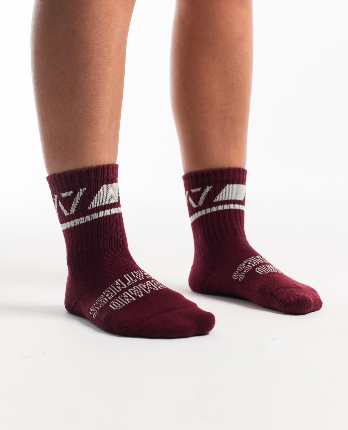 Side profile of A7 Crew Socks in Ivory Rose, highlighting the A7 logo on the ankle and compression-style top.
