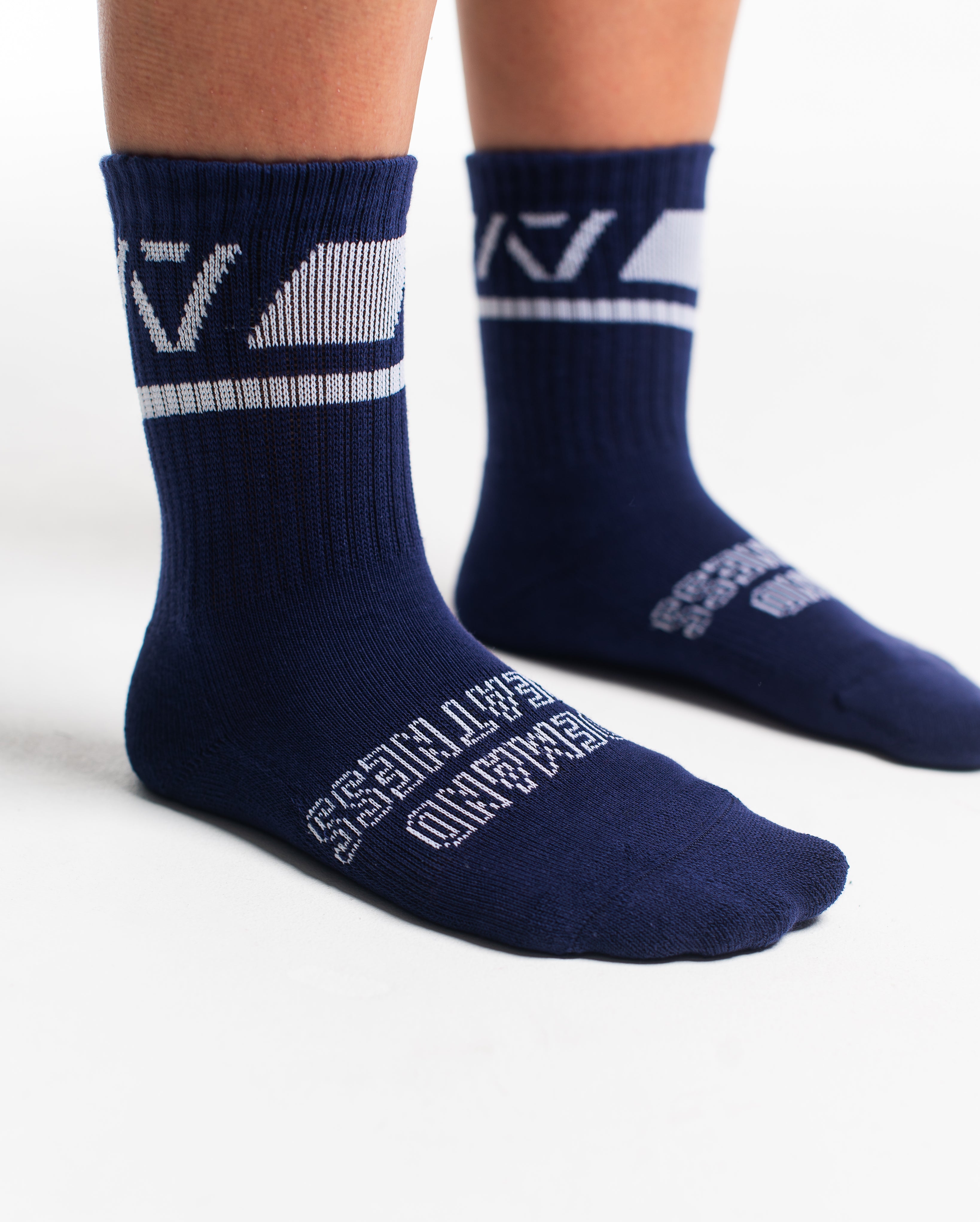 Close-up of the knit fabric on A7 Crew Socks in Night Light, showing texture and stitching details.