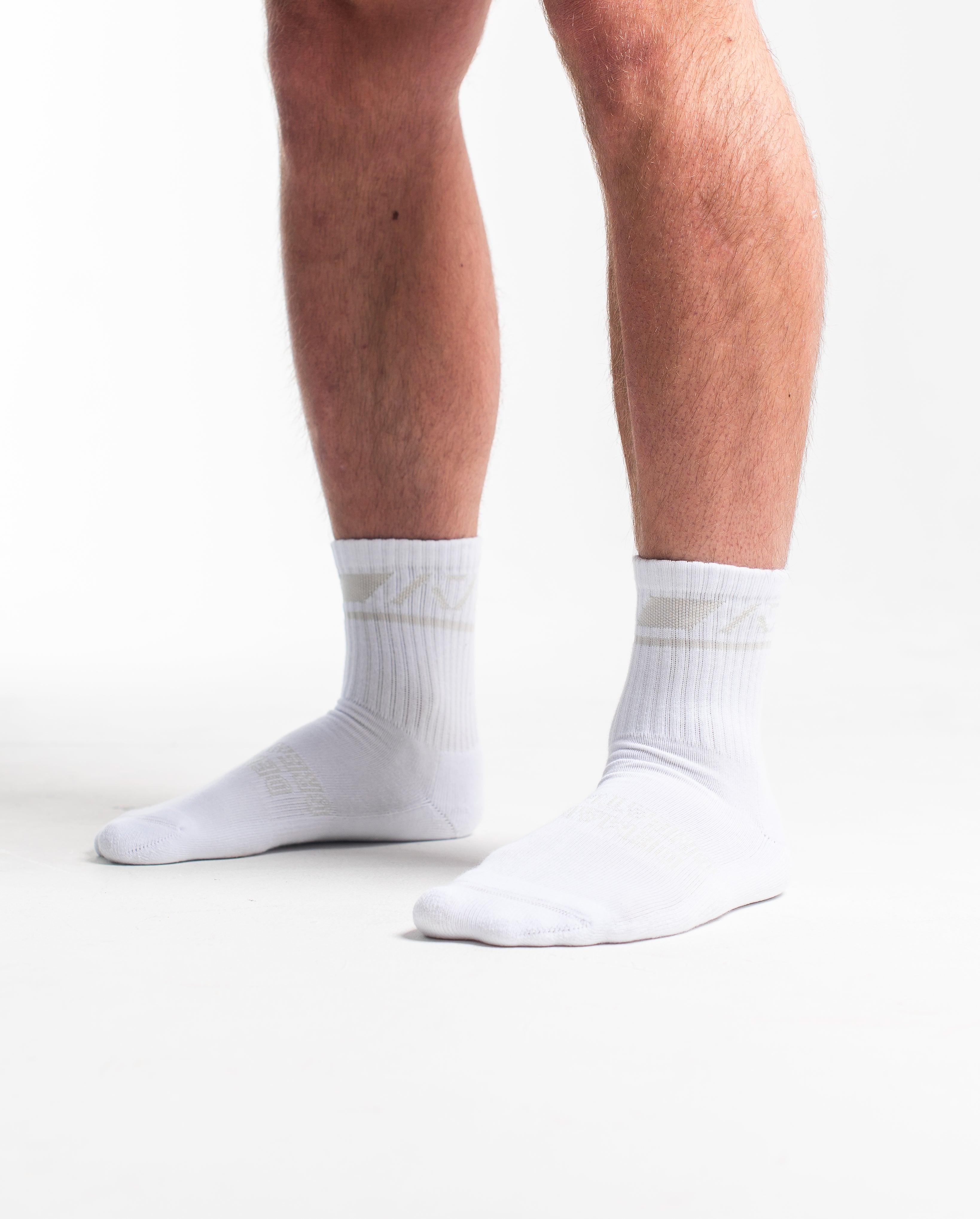 Side profile of A7 Crew Socks in Polar, highlighting the A7 logo on the ankle and compression-style top.