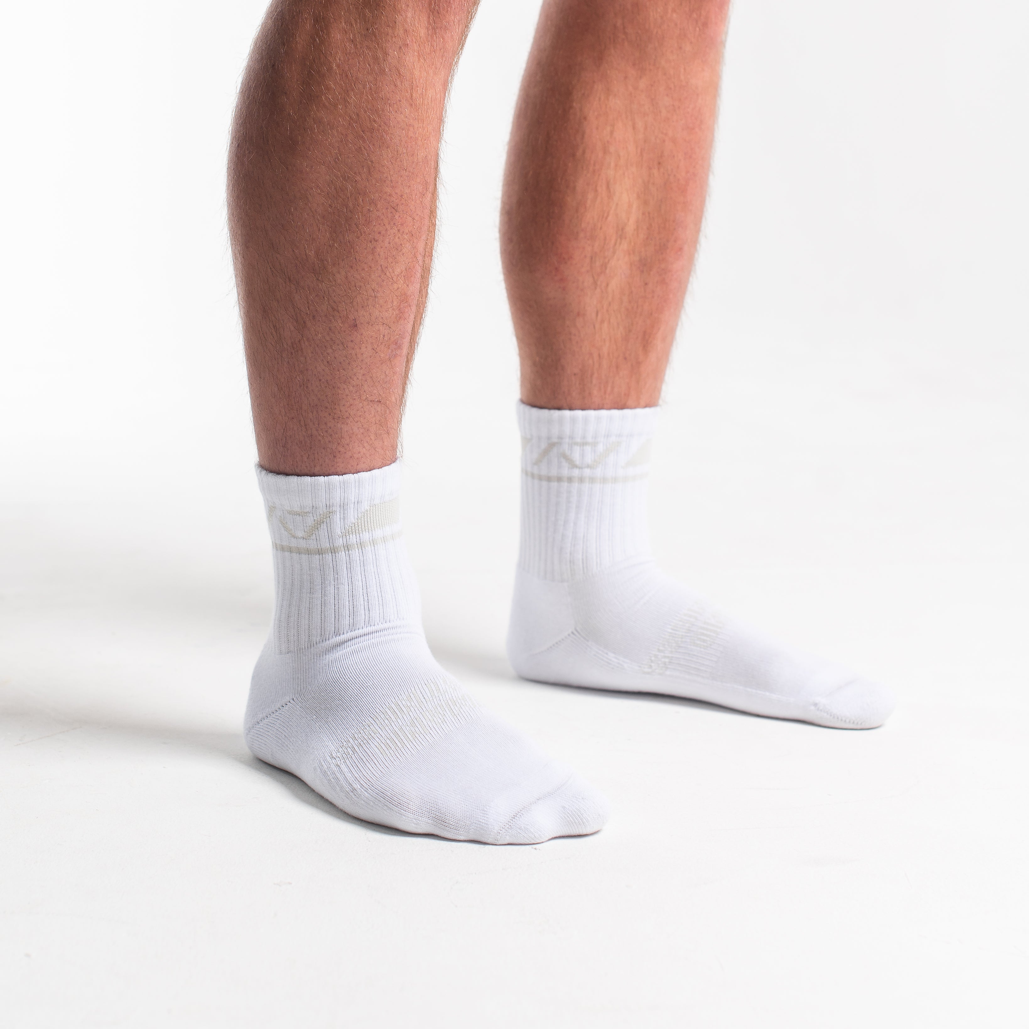 Side profile of A7 Crew Socks in Polar, highlighting the A7 logo on the ankle and compression-style top.