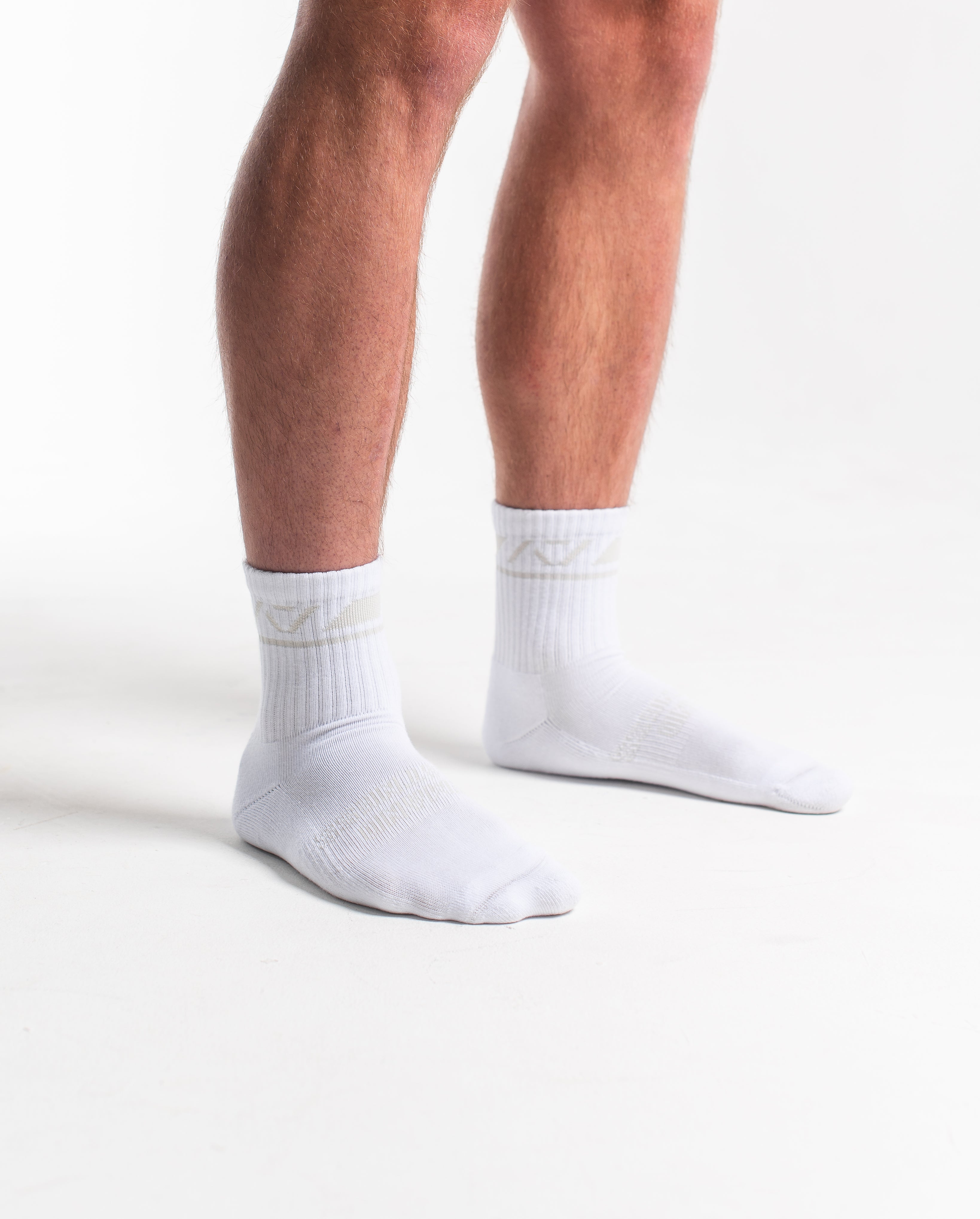 Side profile of A7 Crew Socks in Polar, highlighting the A7 logo on the ankle and compression-style top.