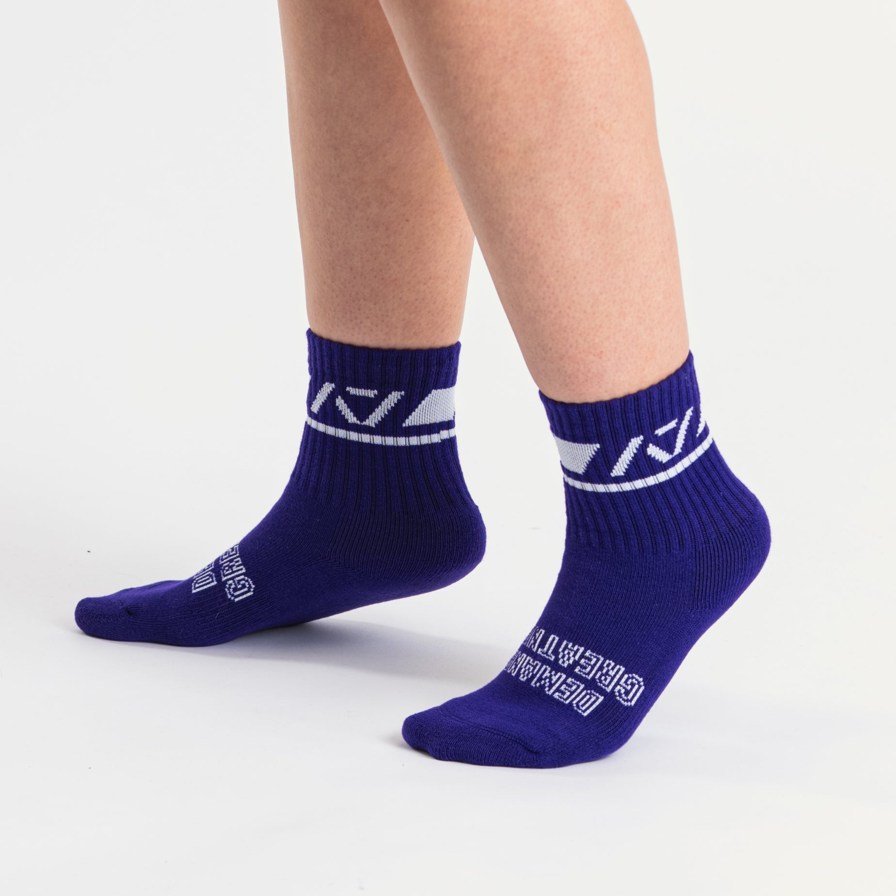 Side profile of A7 Crew Socks in Purple, highlighting the A7 logo on the ankle and compression-style top.