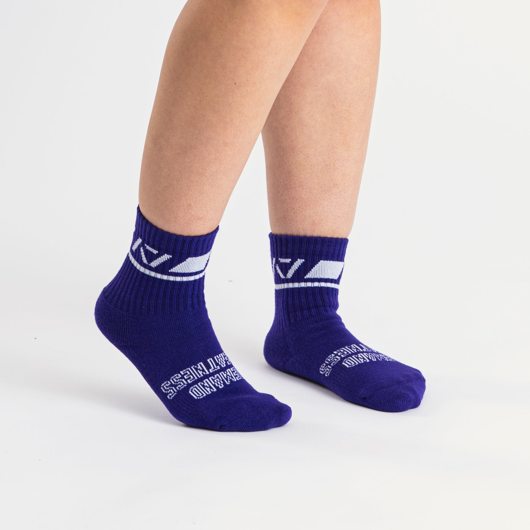 Side profile of A7 Crew Socks in Purple, highlighting the A7 logo on the ankle and compression-style top.