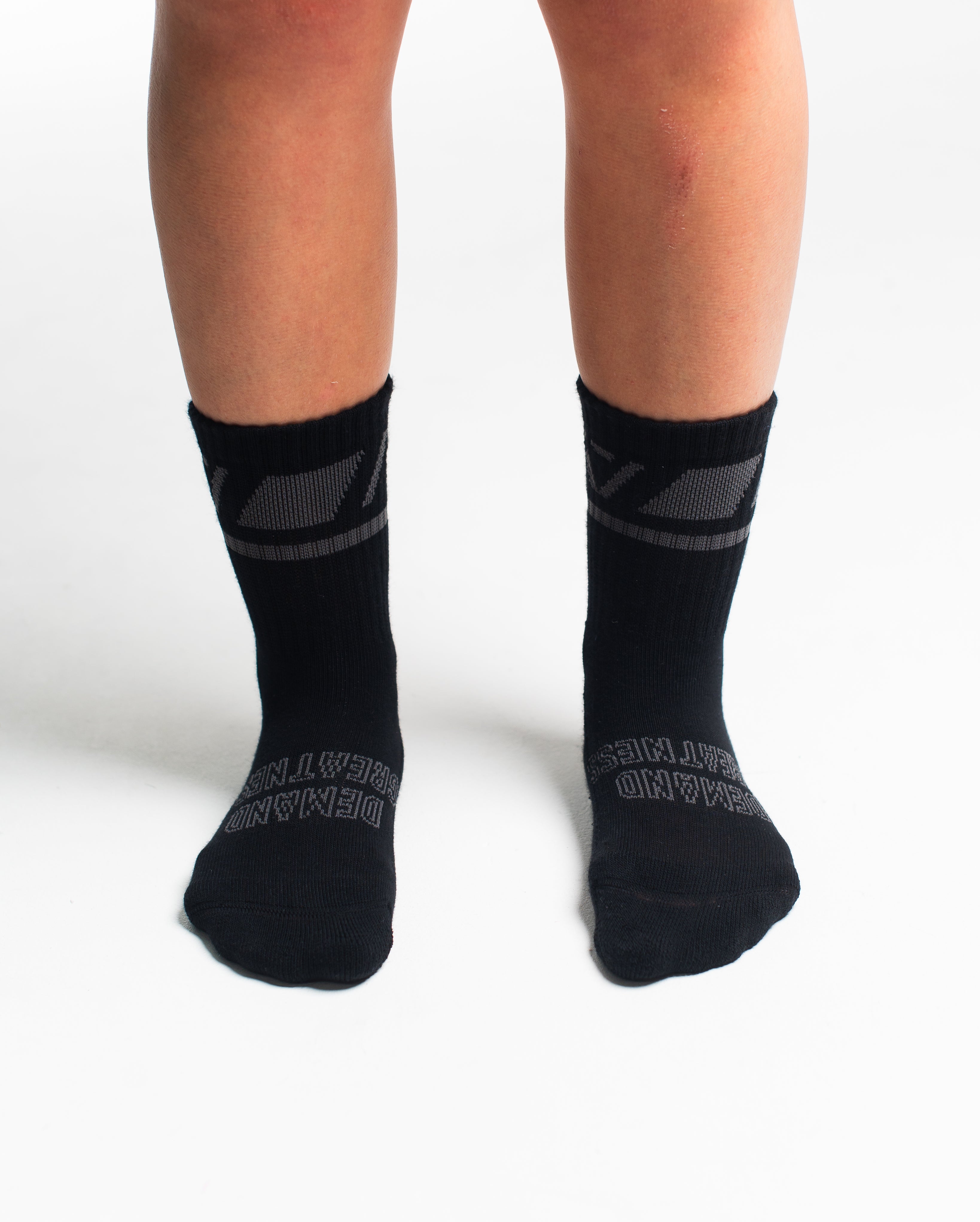 Front view of A7 Crew Socks in Shadow Stone, showcasing mid-shin length and ribbed cuff design.