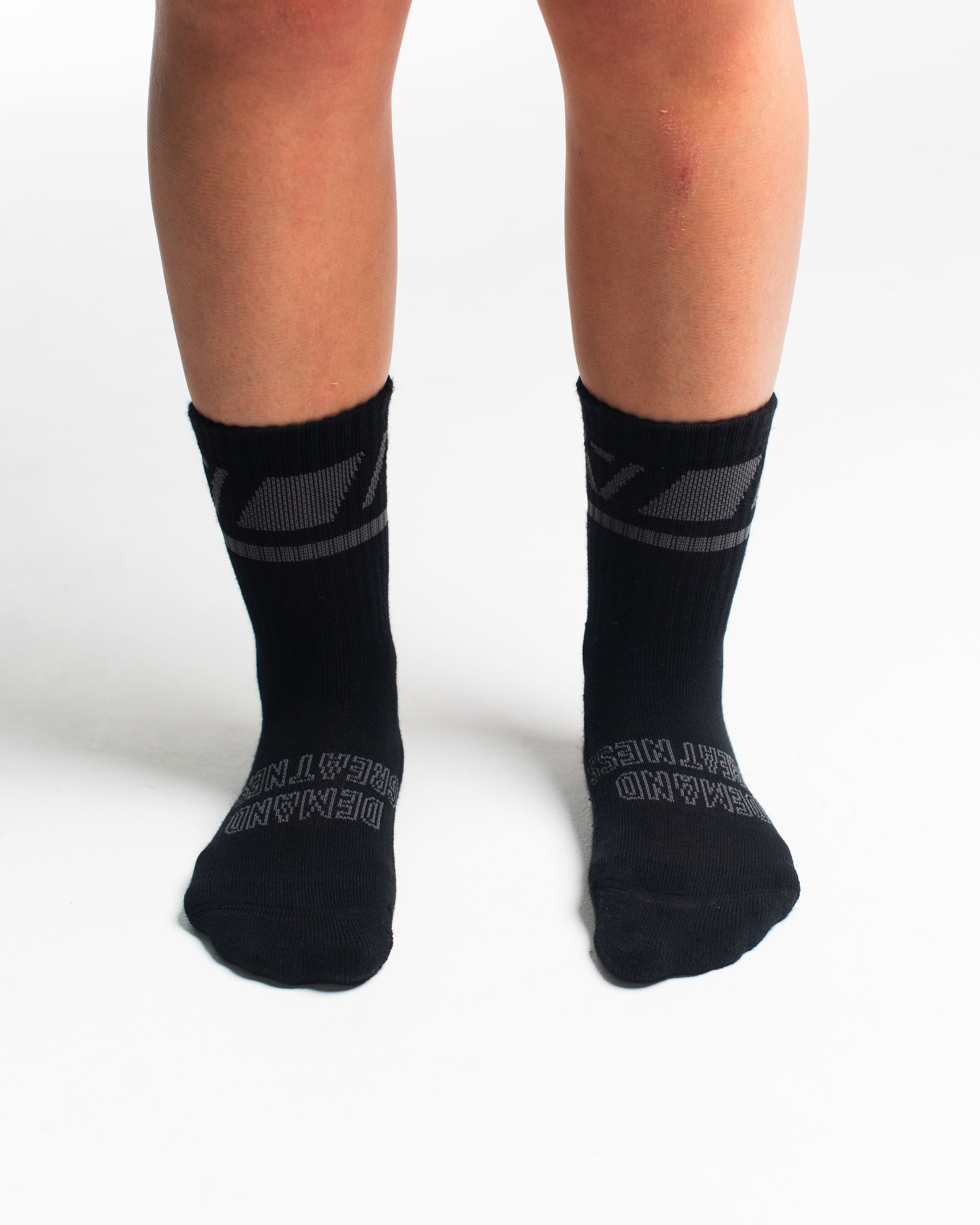 Front view of A7 Crew Socks in Shadow Stone, showcasing mid-shin length and ribbed cuff design.