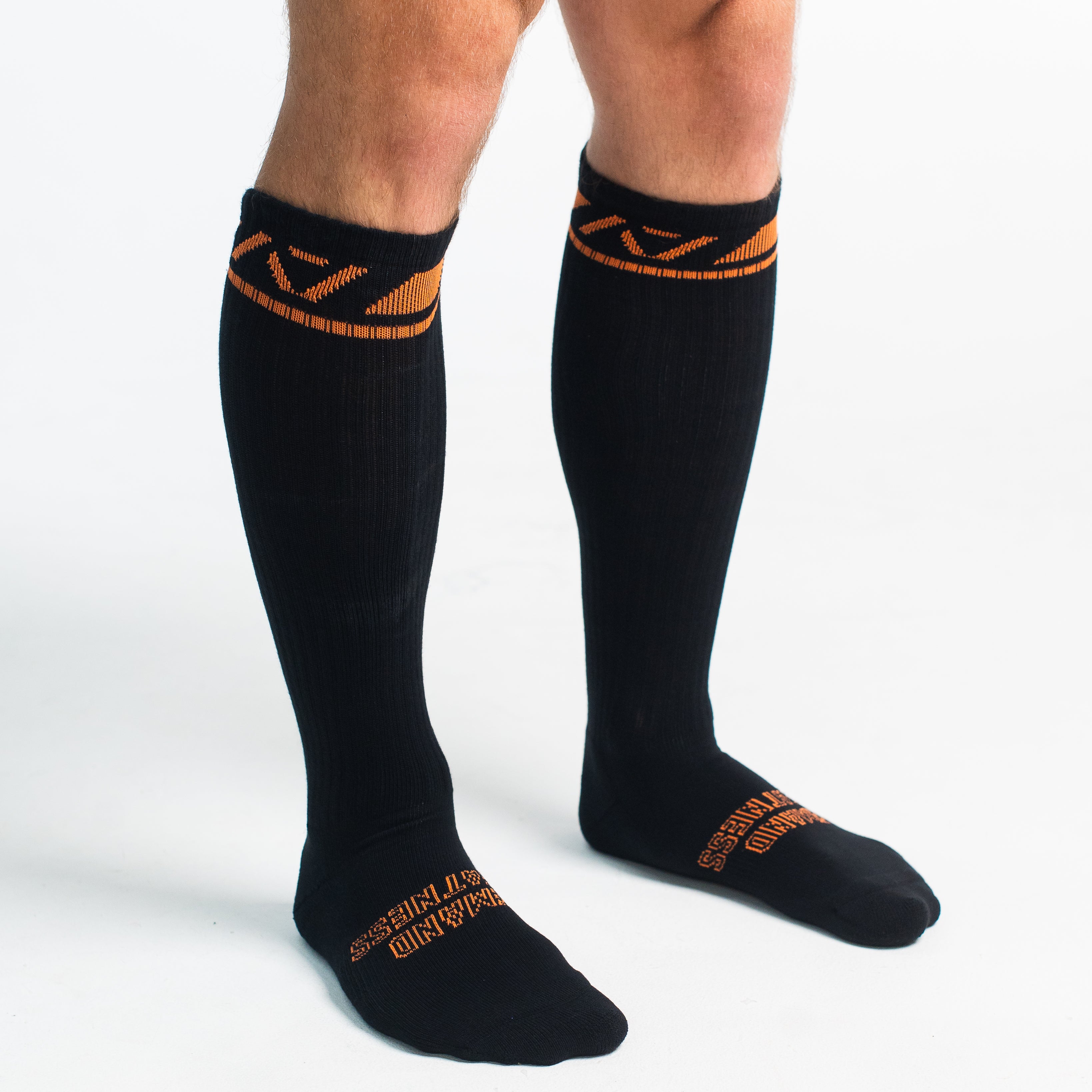 Side profile of A7 Deadlift Socks in Blaze, highlighting the A7 logo on the ankle and compression-style top.