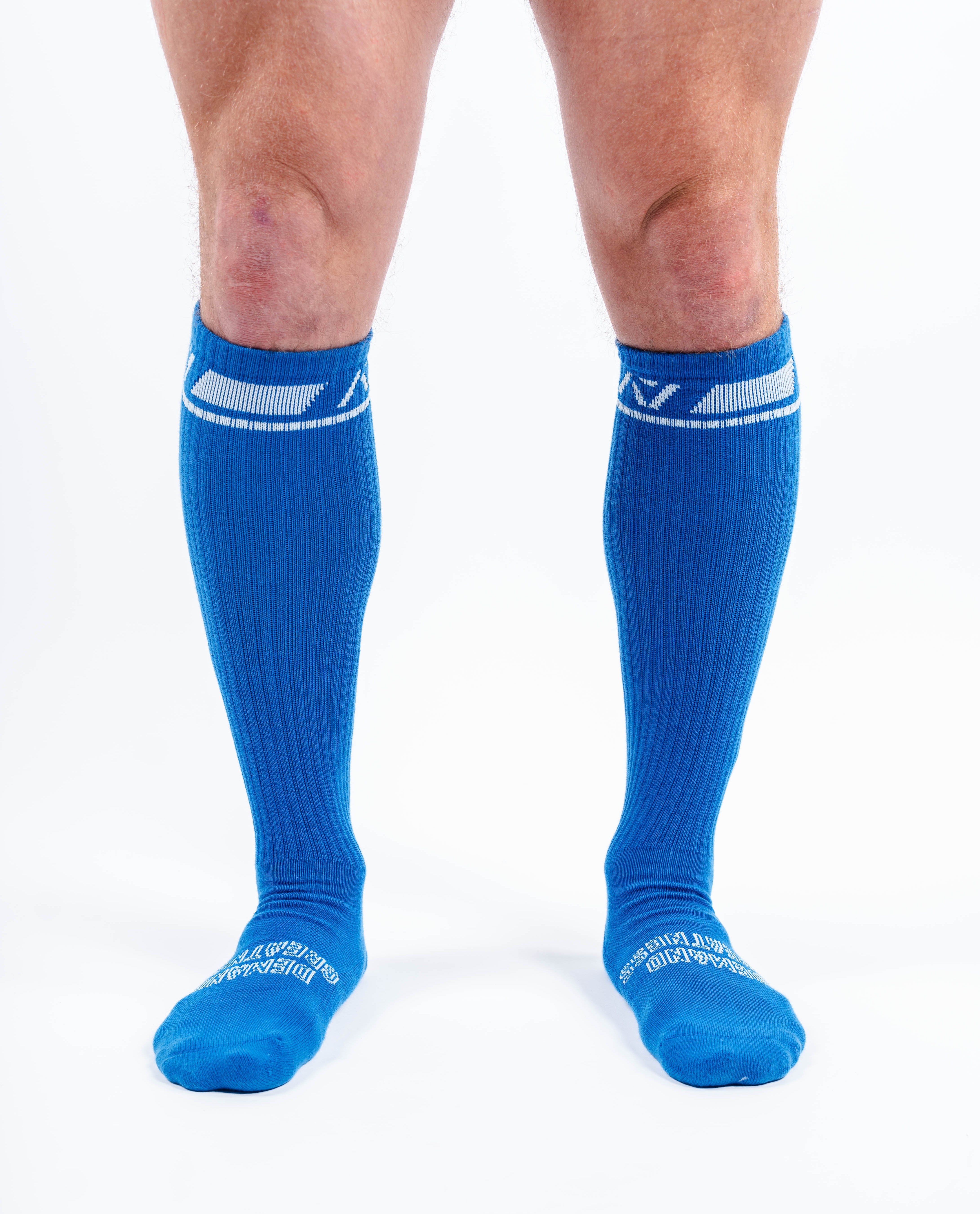 Front view of A7 Deadlift Socks in Cyanite, showcasing mid-shin length and ribbed cuff design.