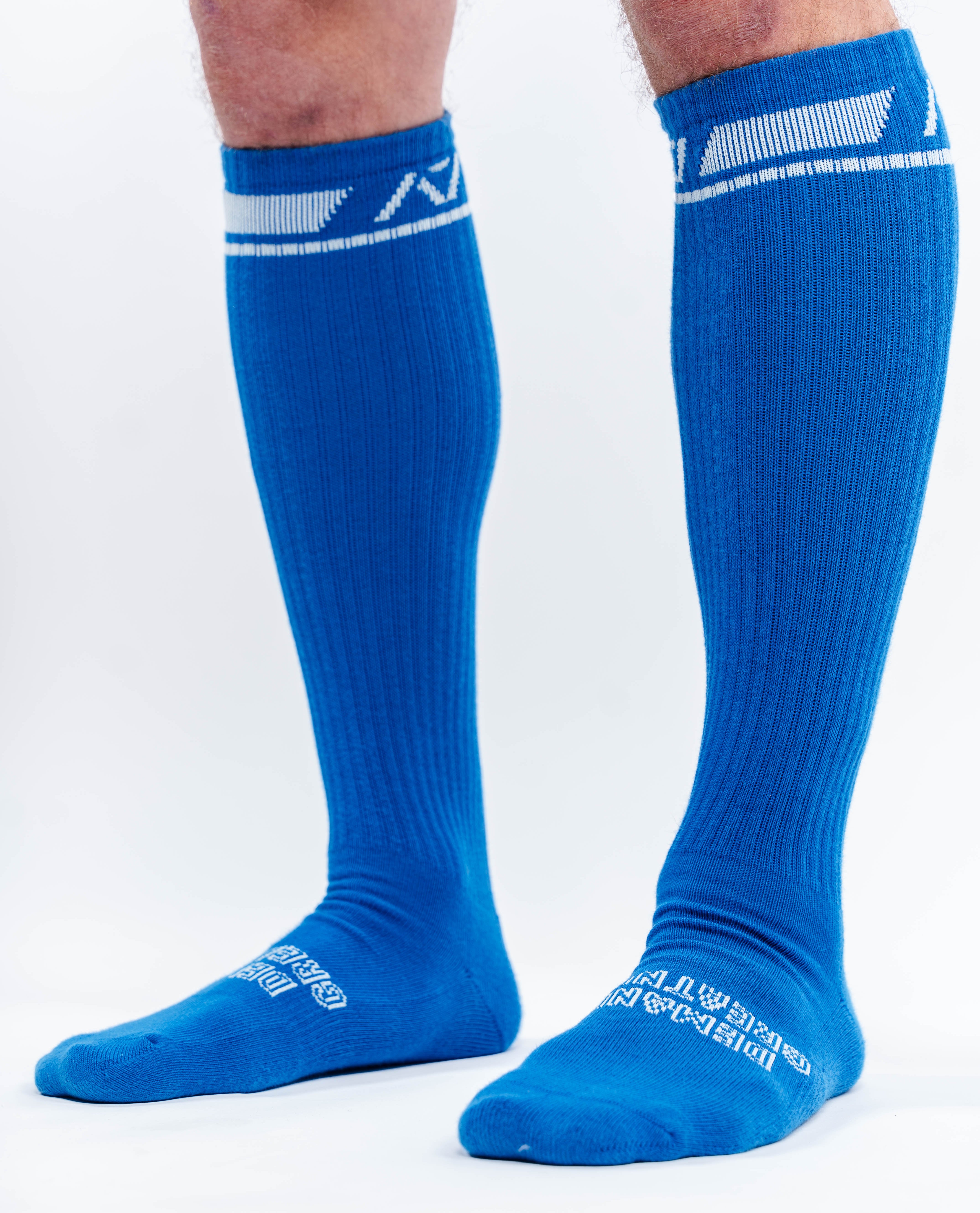 Side profile of A7 Deadlift Socks in Cyanite, highlighting the A7 logo on the ankle and compression-style top.
