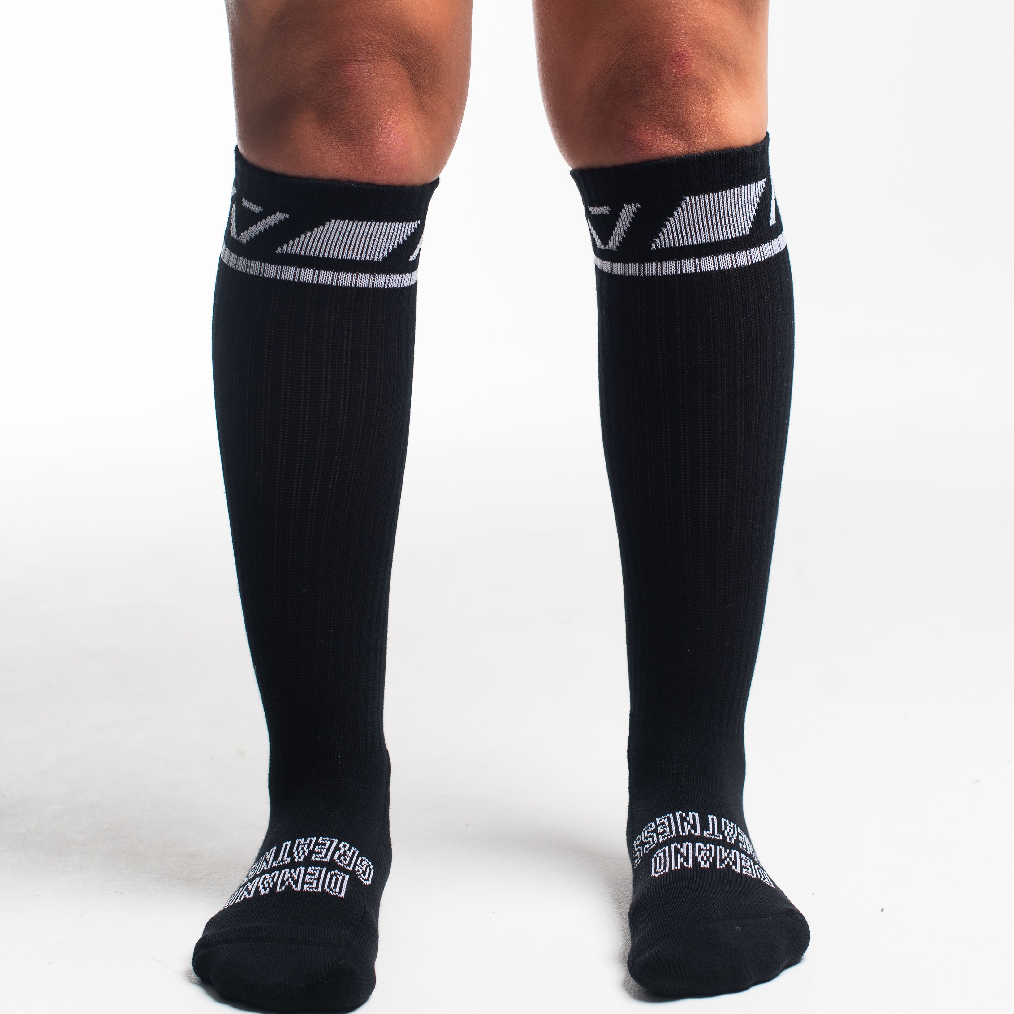 Front view of A7 Deadlift Socks in Domino Black, showcasing knee-high length and ribbed cuff design.