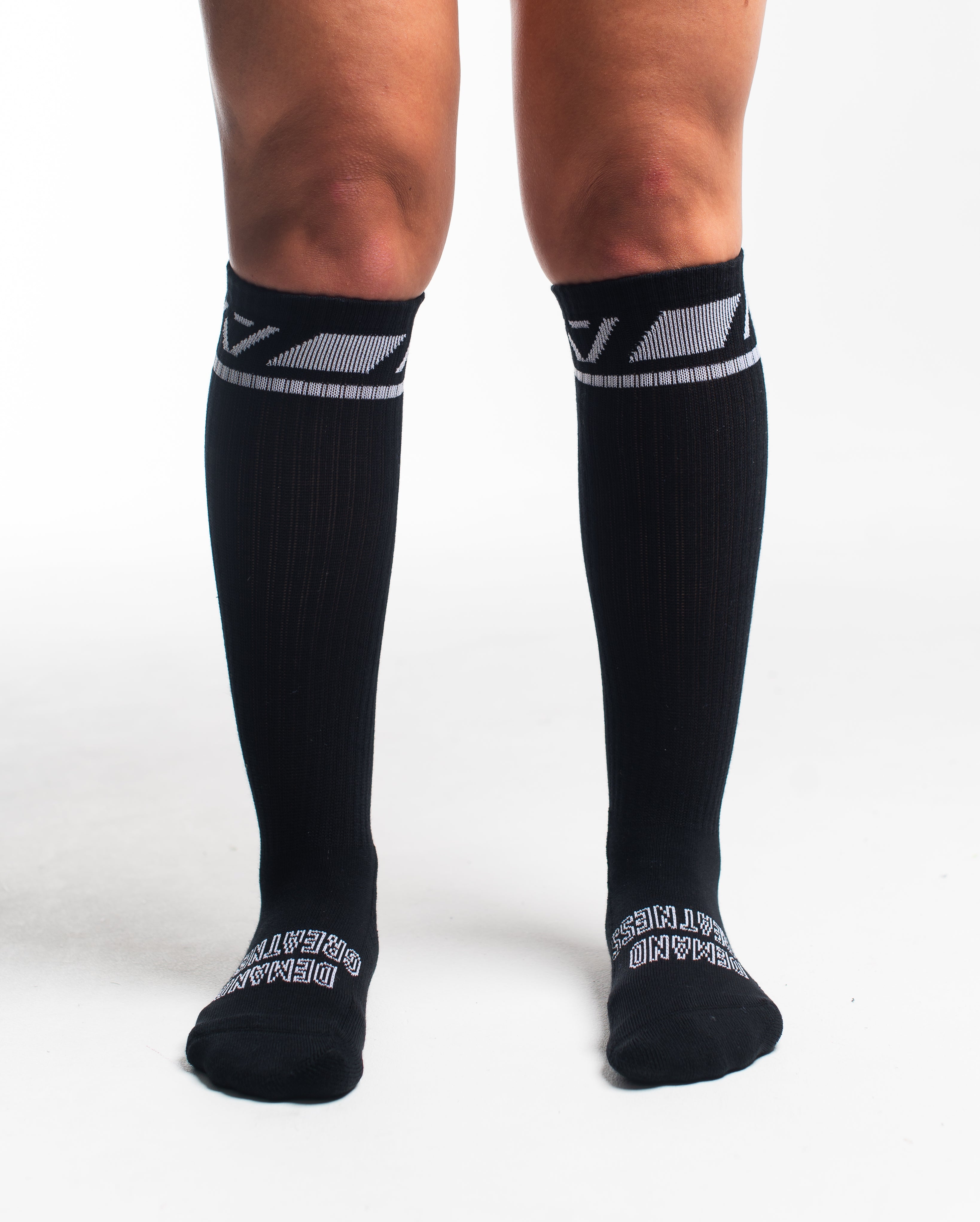 Front view of A7 Deadlift Socks in Domino Black, showcasing knee-high length and ribbed cuff design.