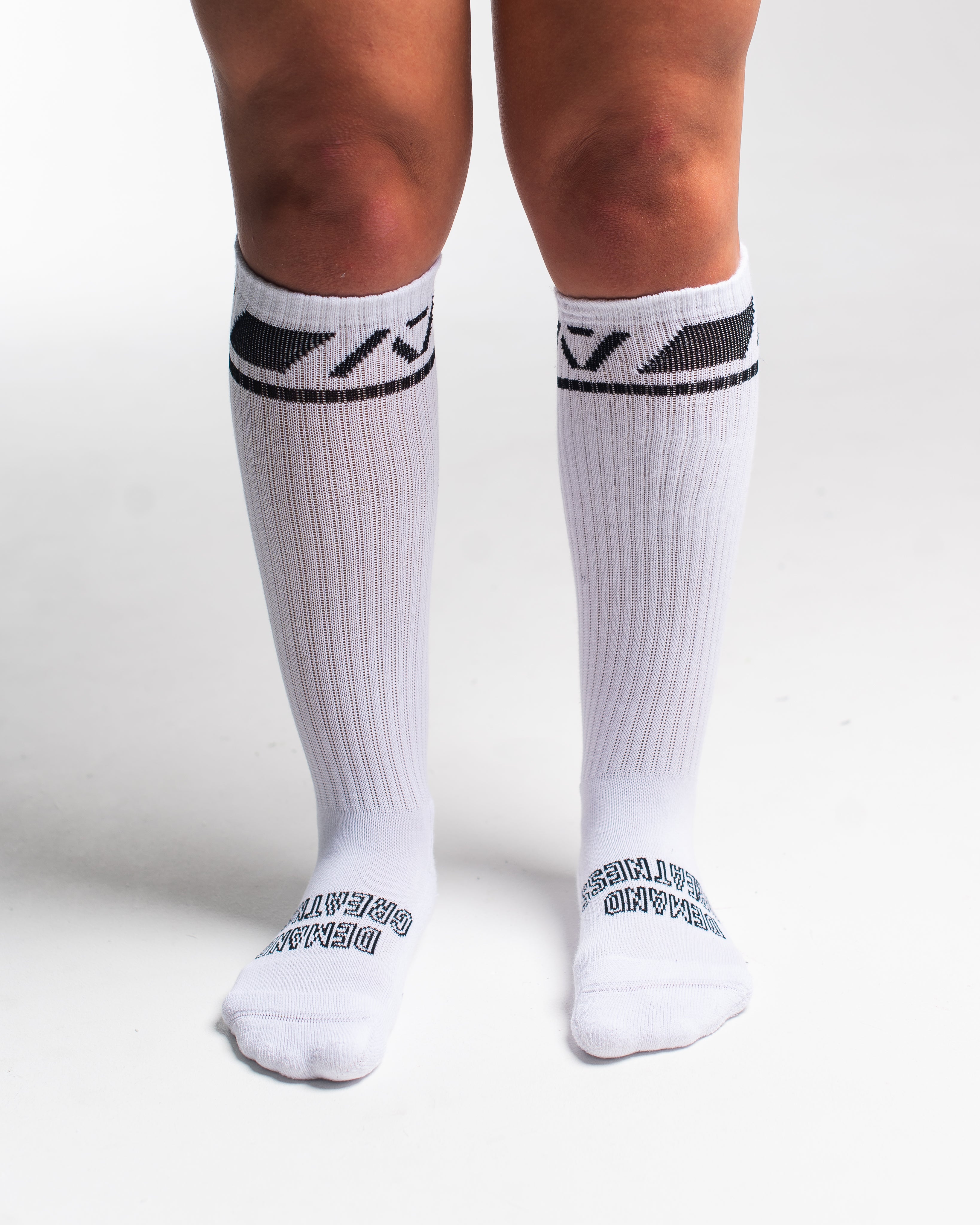 Front view of A7 Deadlift Socks in Domino White, showcasing knee-high length and ribbed cuff design.
