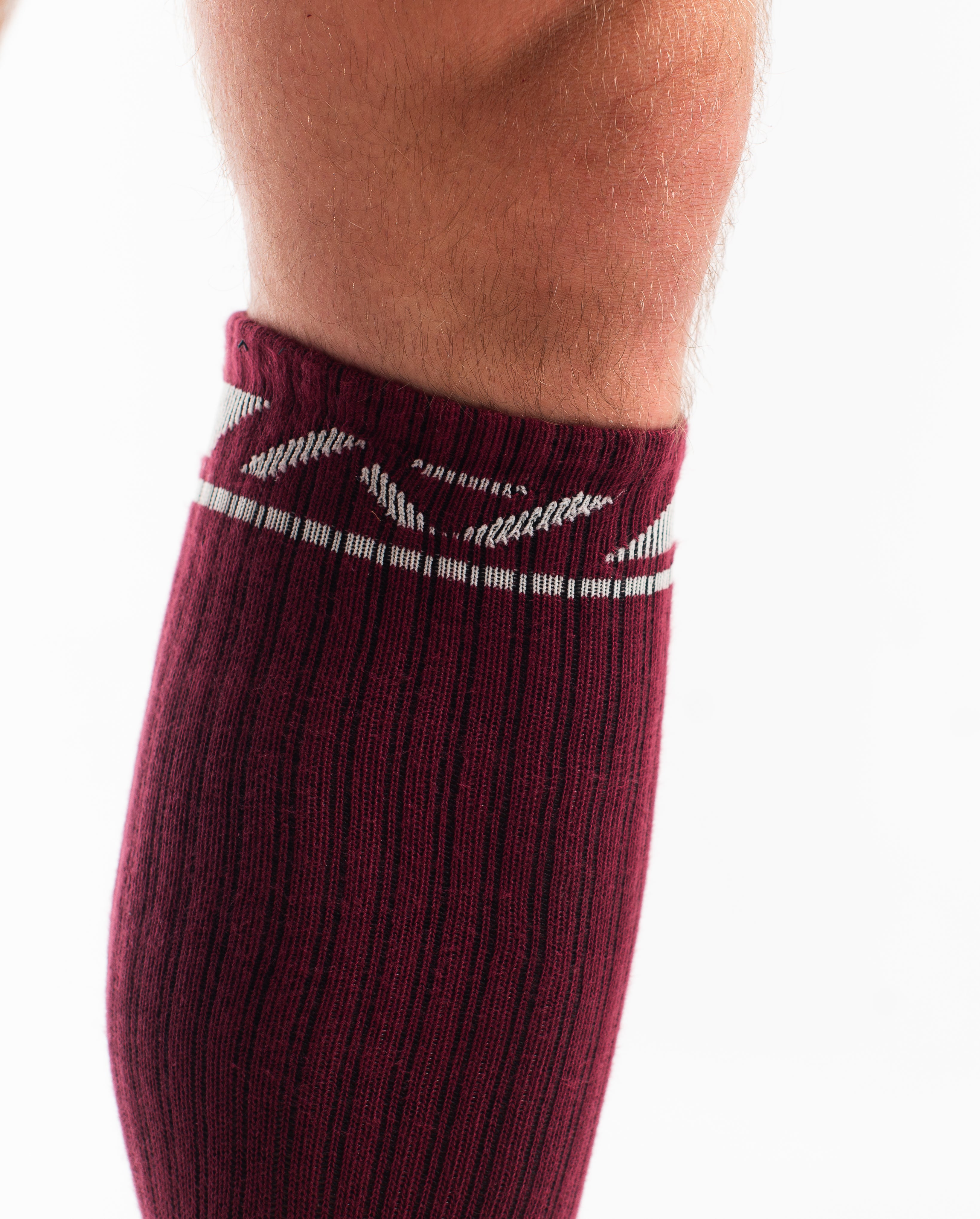 Close-up of the knit fabric on A7 Deadlift Socks in Ivory Rose, showing texture and stitching details.