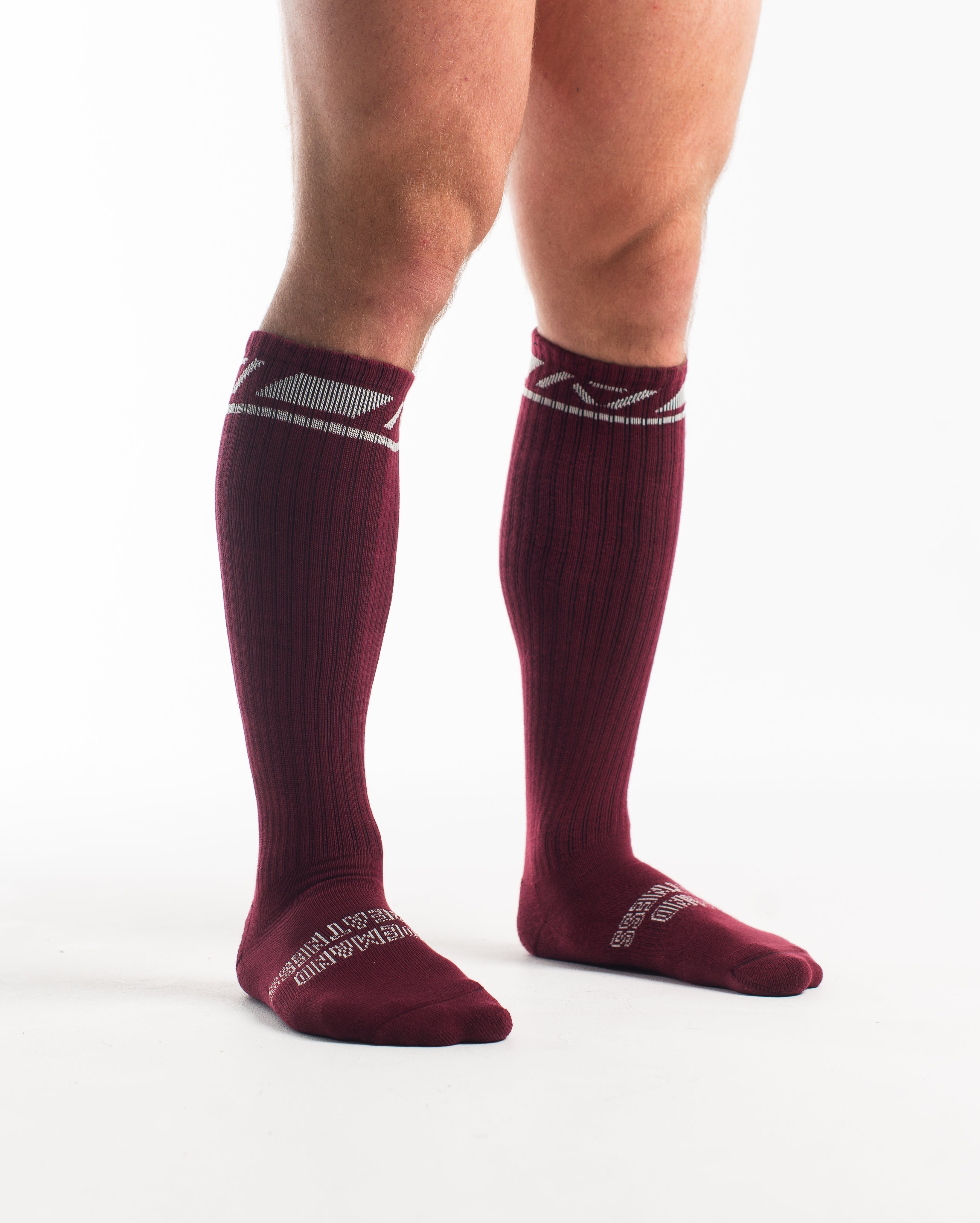 Side profile of A7 Deadlift Socks in Ivory Rose, highlighting the A7 logo on the ankle and compression-style top.