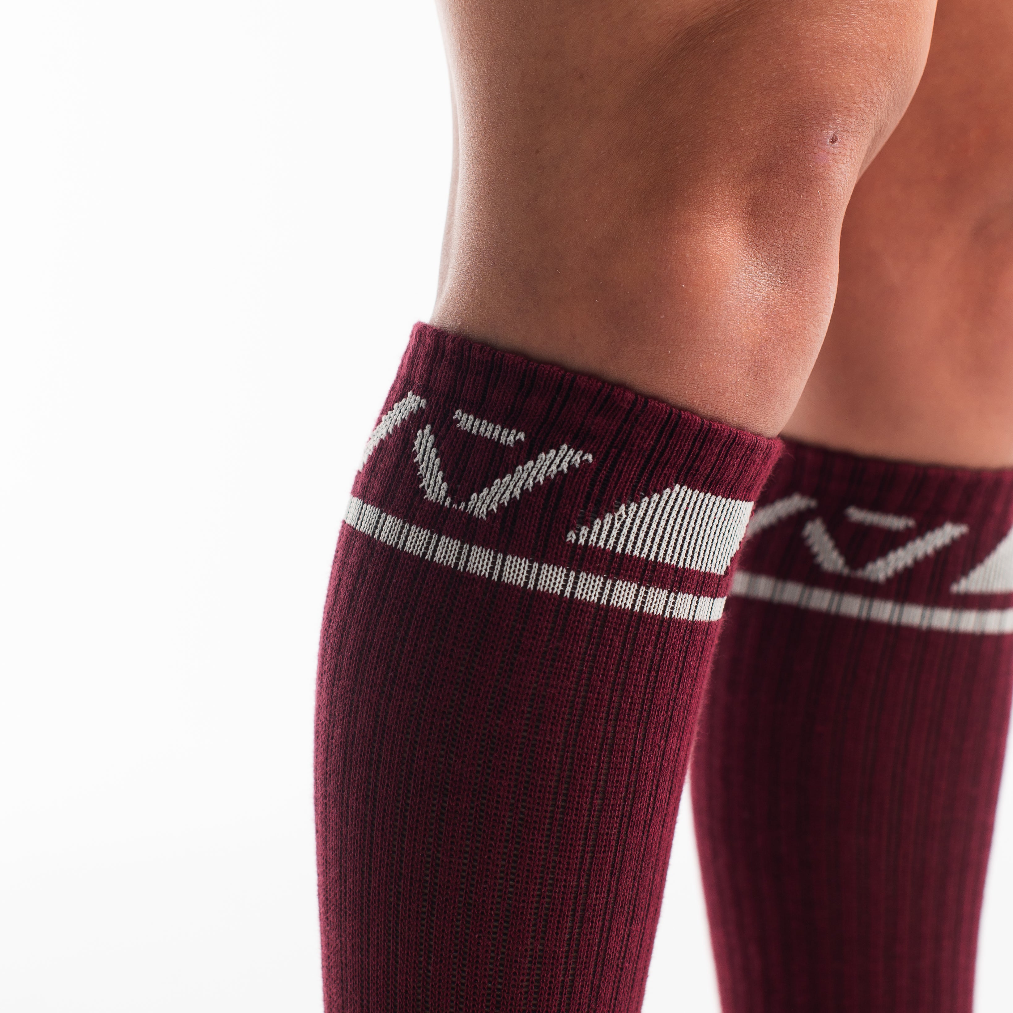 Side profile of A7 Deadlift Socks in Ivory Rose, highlighting the A7 logo on the ankle and compression-style top.