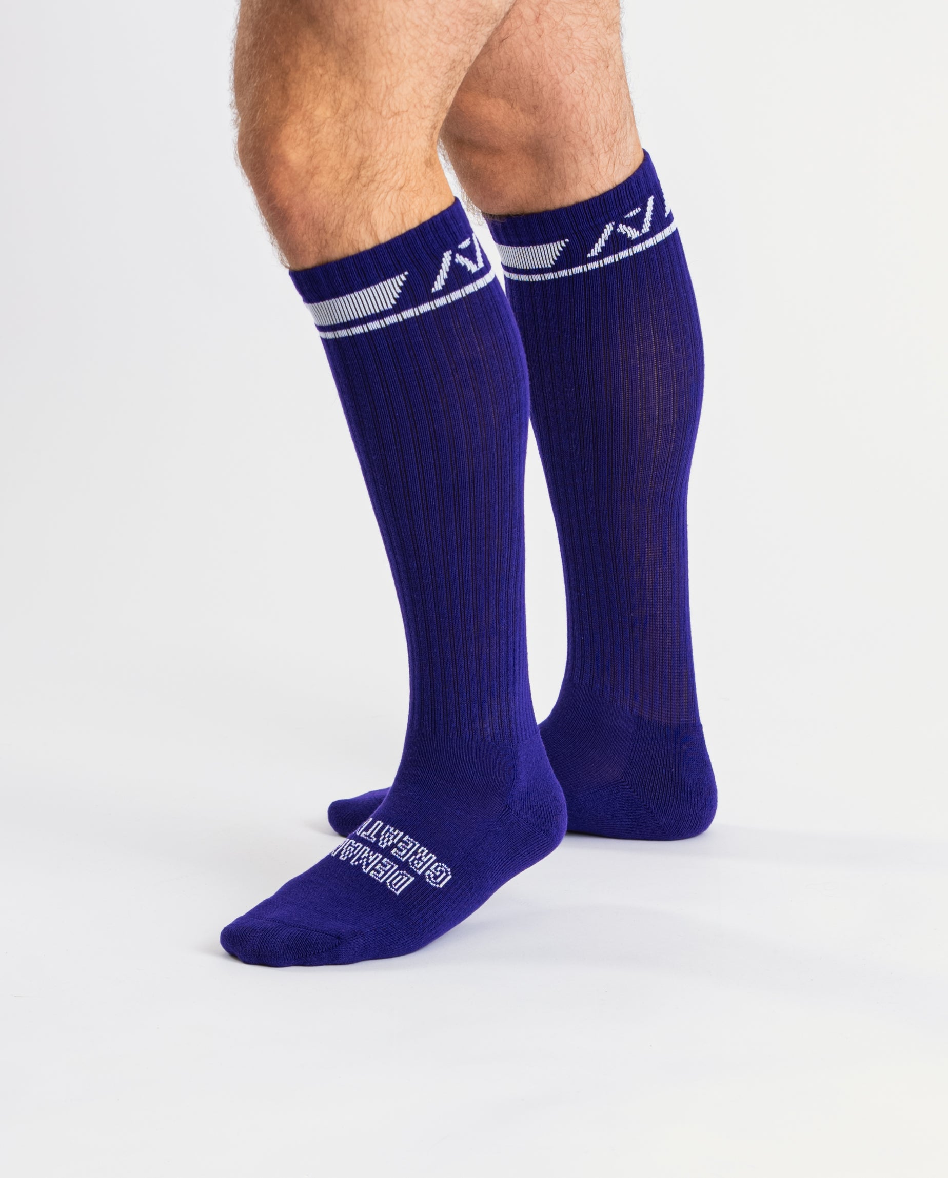 Side profile of A7 Deadlift Socks in purple, highlighting the A7 ankle logo and supportive compression fit.