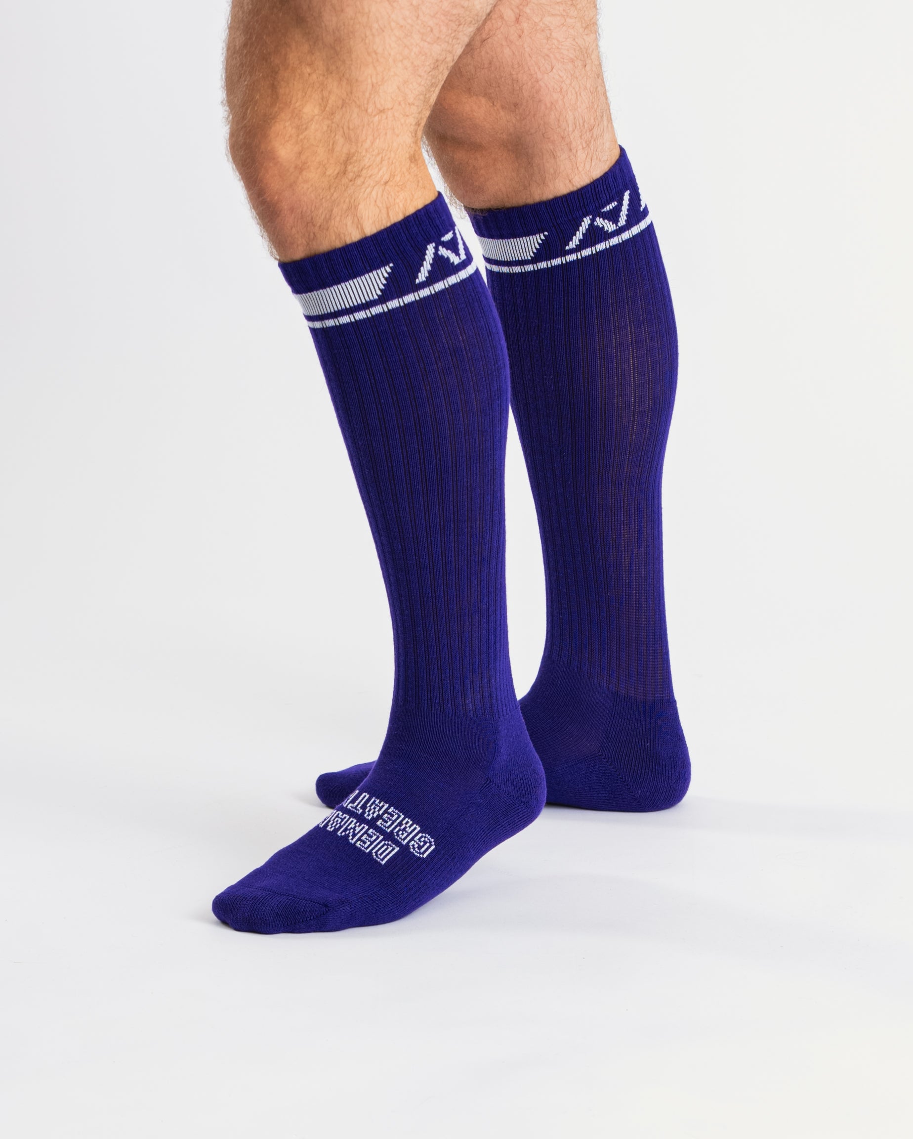 Side profile of A7 Deadlift Socks in purple, highlighting the A7 ankle logo and supportive compression fit.