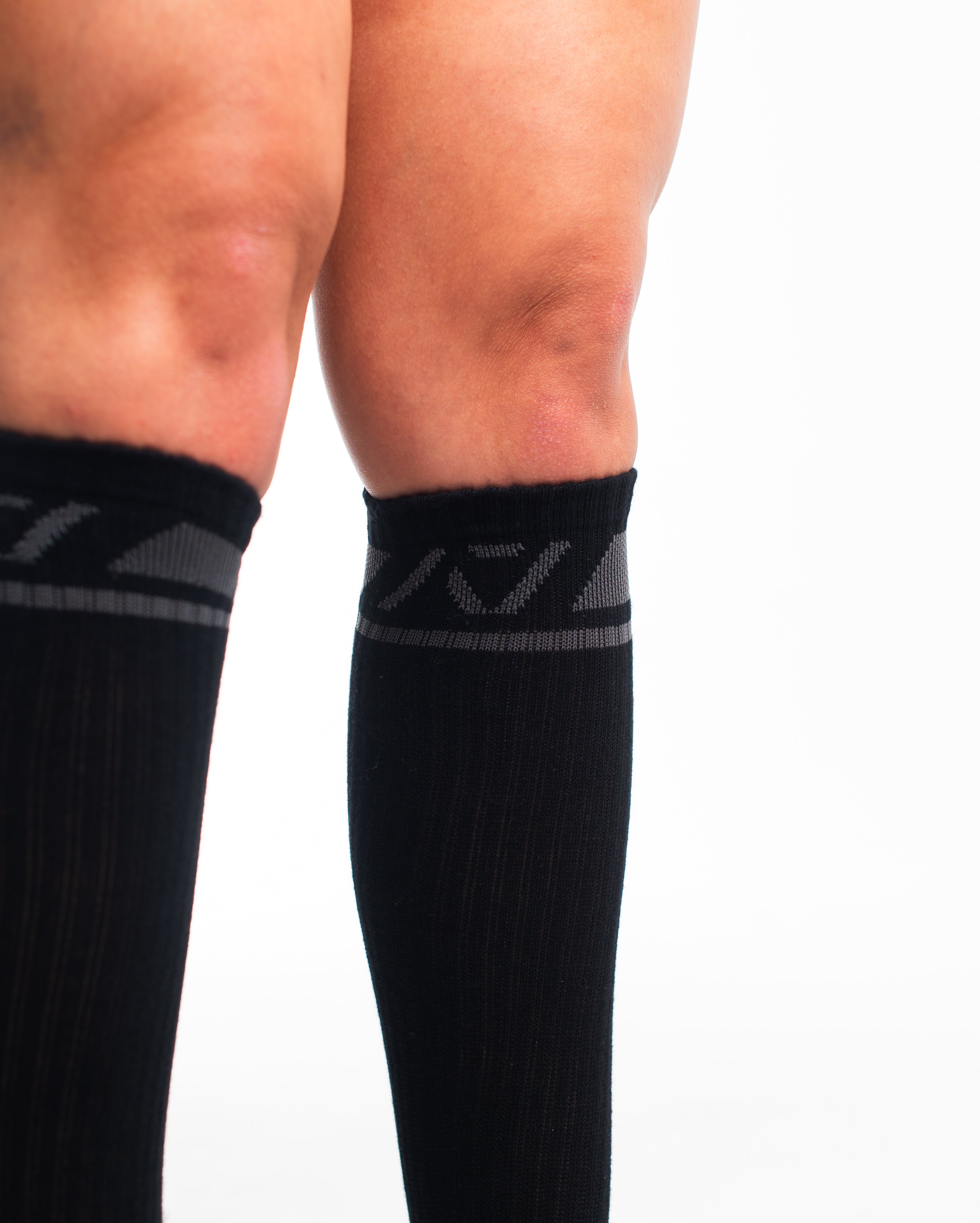 Close-up of knit fabric on Shadow Stone socks, showing stitch detail and high-quality material.