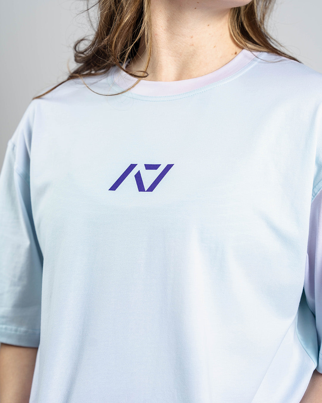 Tonal A7 logo screen-printed on the Affirmation Over-Fit Shirt – Pastel for clean and subtle branding.